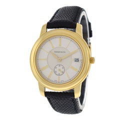 Authentic Unisex Tiffany & Co. Mark Round 18 Karat Yellow Gold Date Quartz Watch