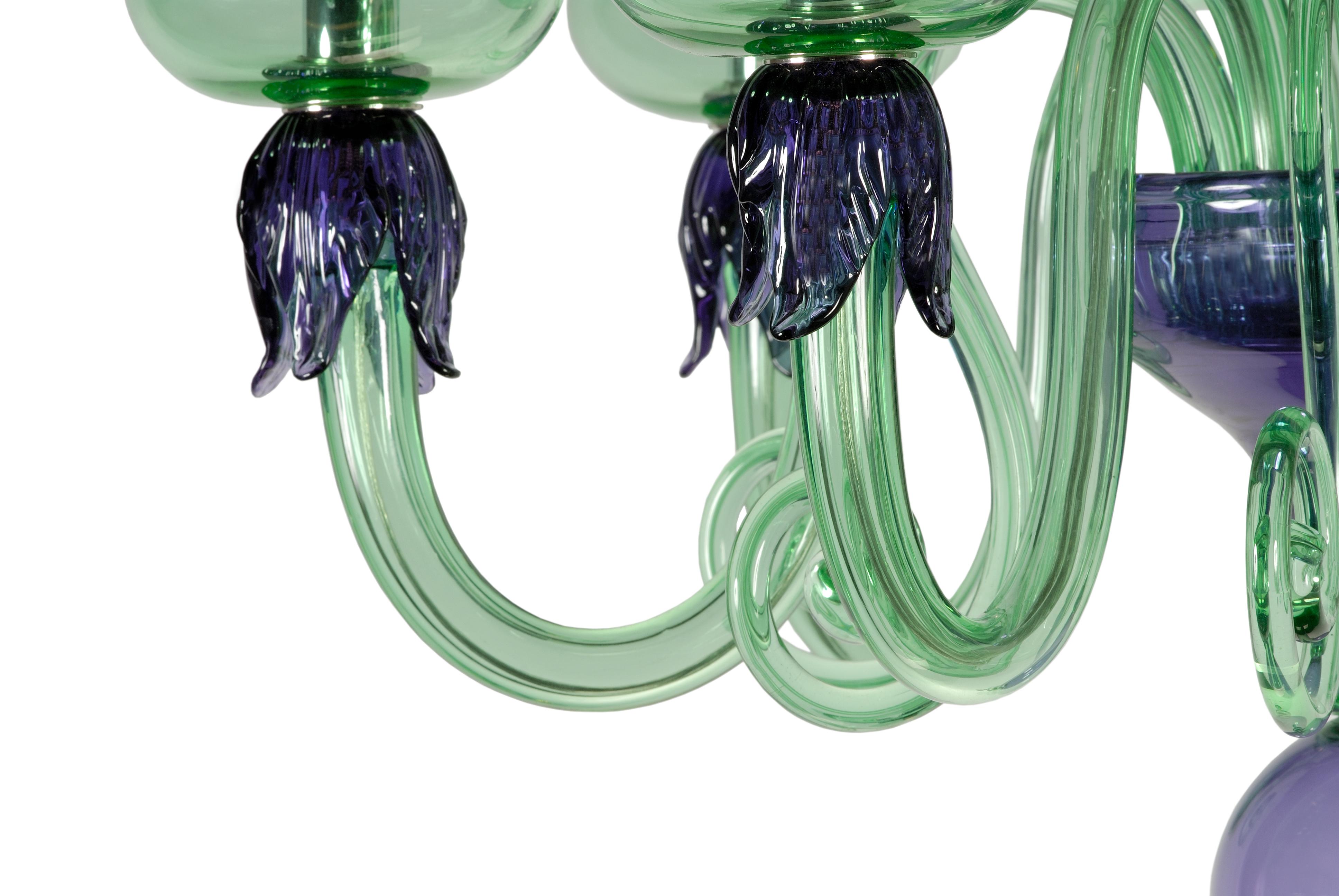 Add a touch of timeless elegance to your home decor with this exquisite Venetian classic chandelier, expertly handmade in Murano glass. Featuring six lights, this chandelier is a true masterpiece created by skilled Murano masterglass artisans, using