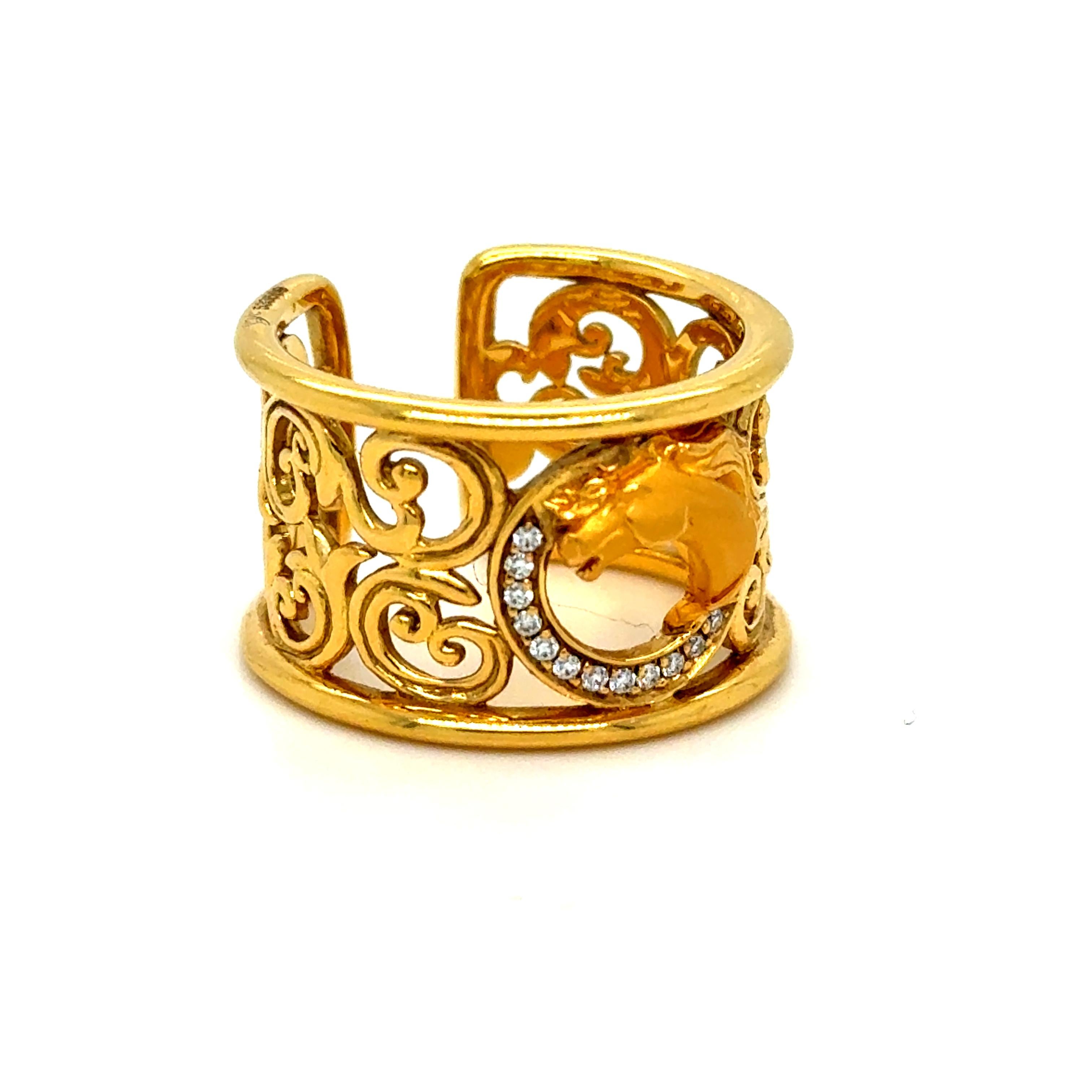 Stupendo anello con cavallo Carrera y Carrera d'epoca in oro giallo 18 carati con diamanti

Aggiungi un tocco di lusso ed eleganza equestre alla tua collezione con questo anello a testa di cavallo mozzafiato di Carrera y Carrera. Conosciuta per la