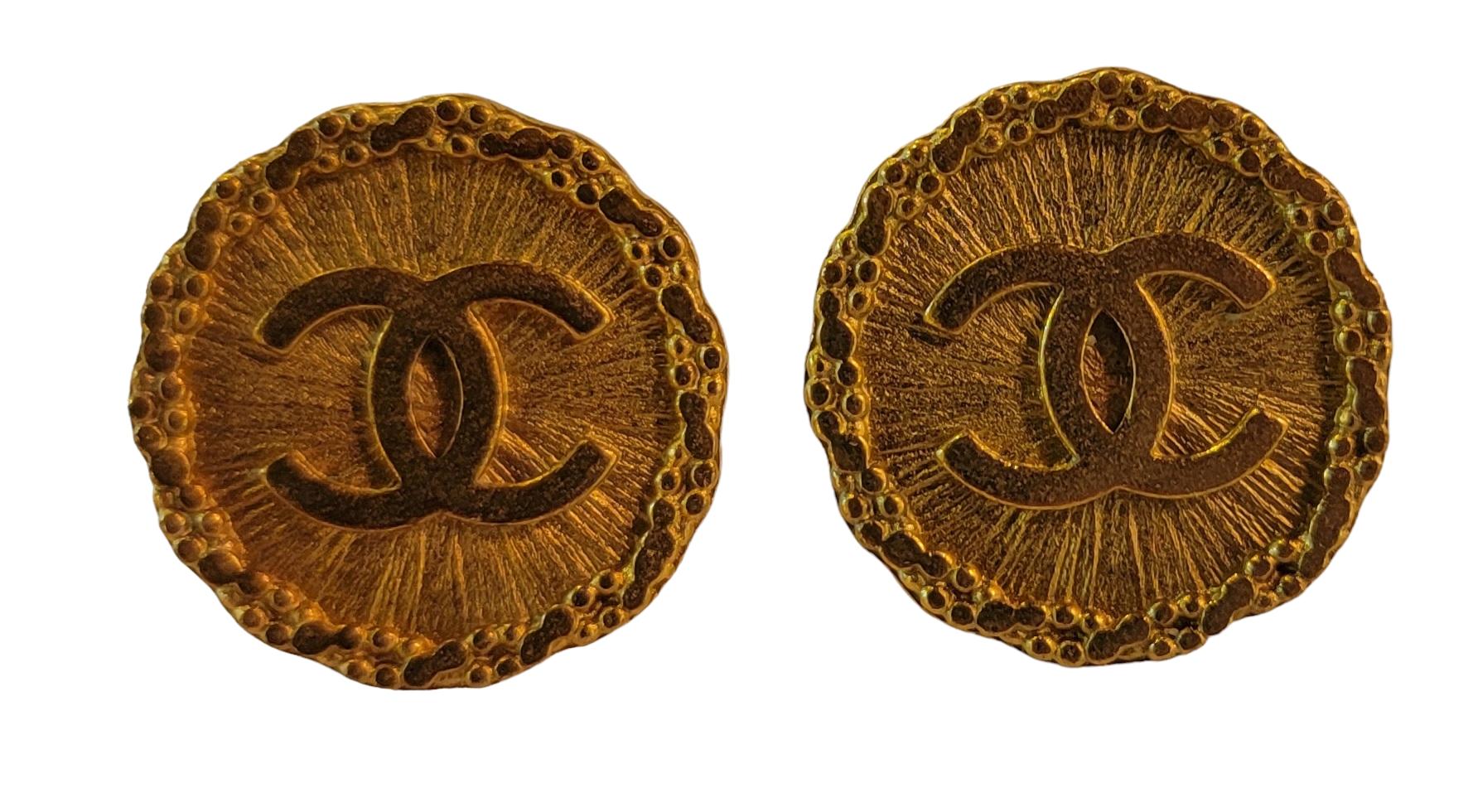 Authentic Vintage Chanel 80s Large CC Earrings. Beautiful sunburst design. With Soft Ridged edges. Great used condition. 
