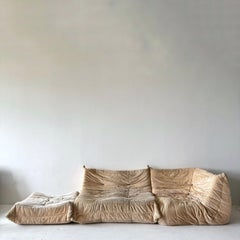 Authentic vintage sand colored three piece Togo set with fabric upholstery