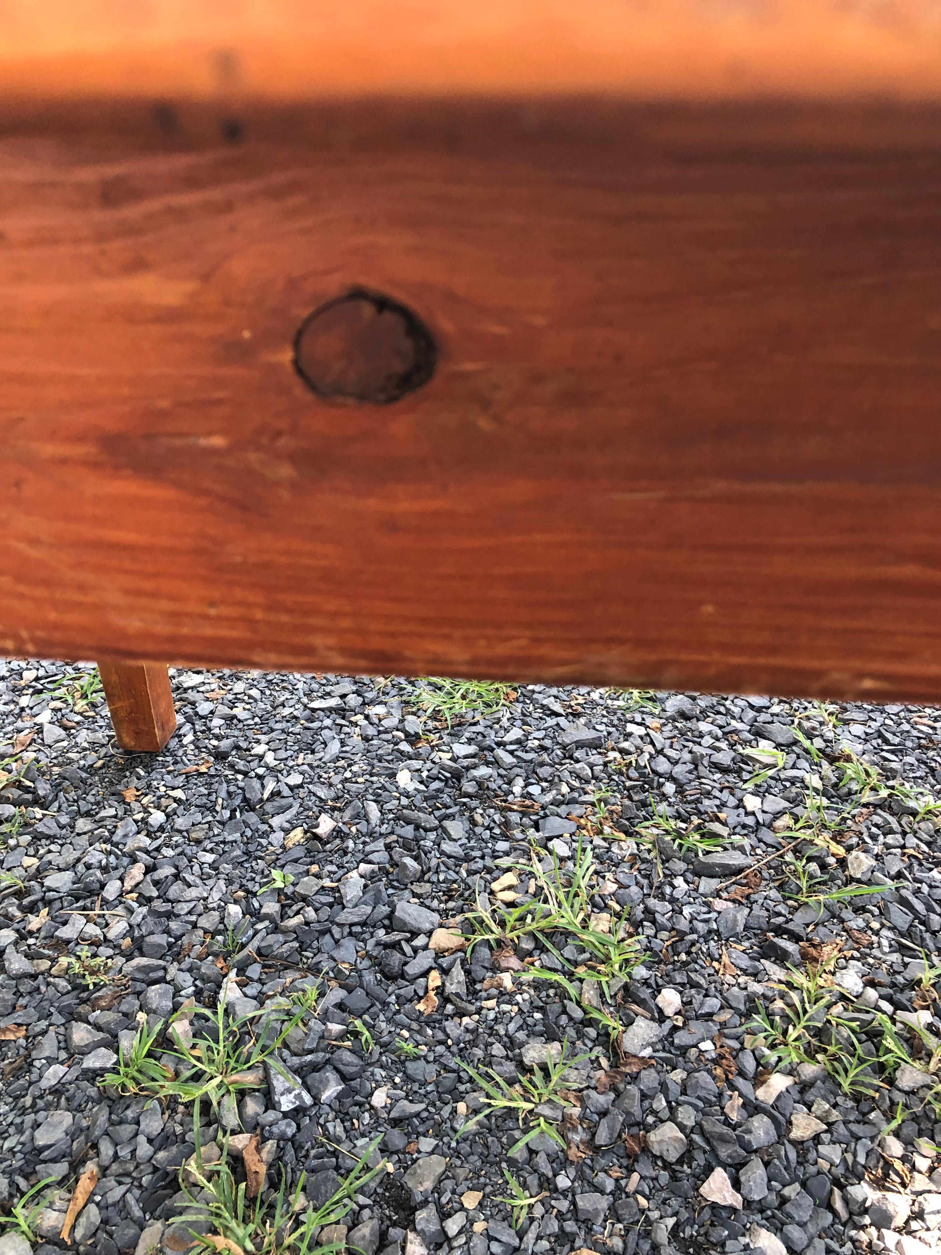 Warm and welcoming vintage pine farm table having wonderful aged patina and lively grain with a deep honey color.  Legs are tapered.  Apron 24.75