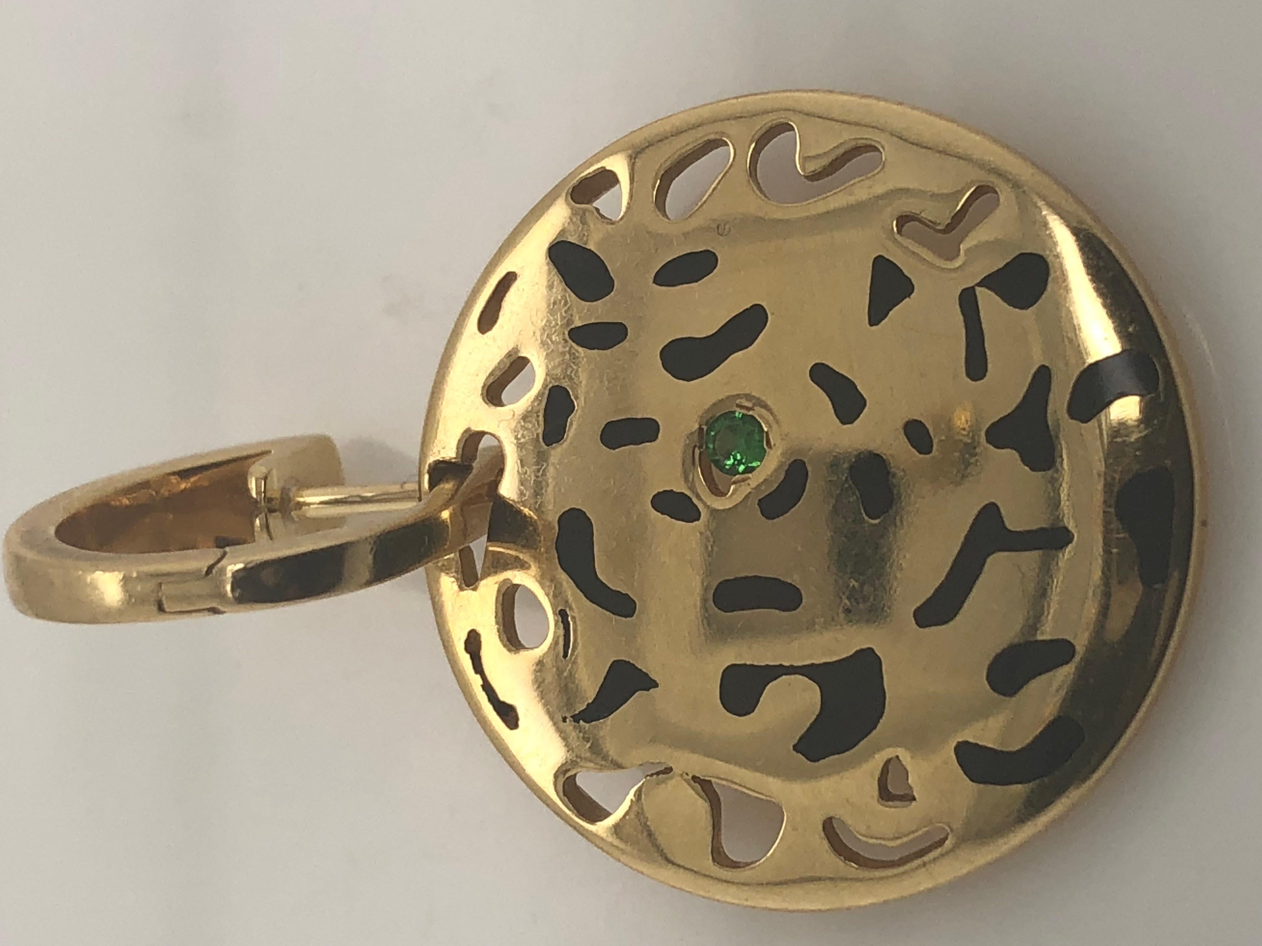 Featuring a pair of original Panthere de Cartier earrings by Cartier. Set in 18K yellow gold with Tsavorite garnet eyes and black lacquer spots
Racket system and stems. Comes with an original box.

Measurements: Medal 20mm in diameter, entire length