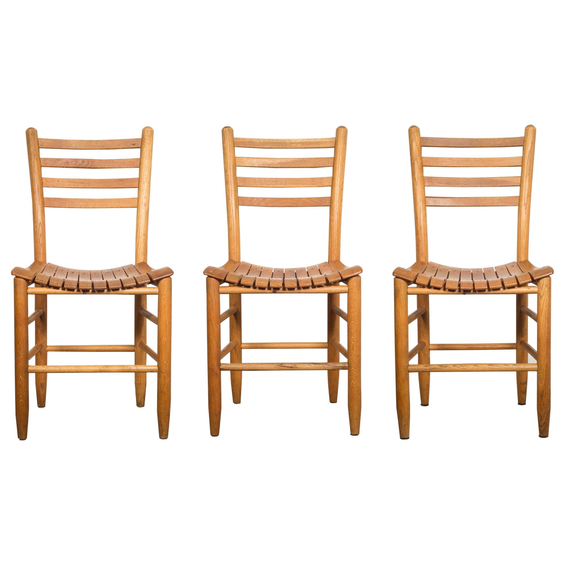 About

Wooden ladder back dining chairs with slotted seats in the style of Author Umanoff. These chairs have retained their original finish and have the appropriate patina for the age and use. Each chair is sturdy and structurally sound.

Price