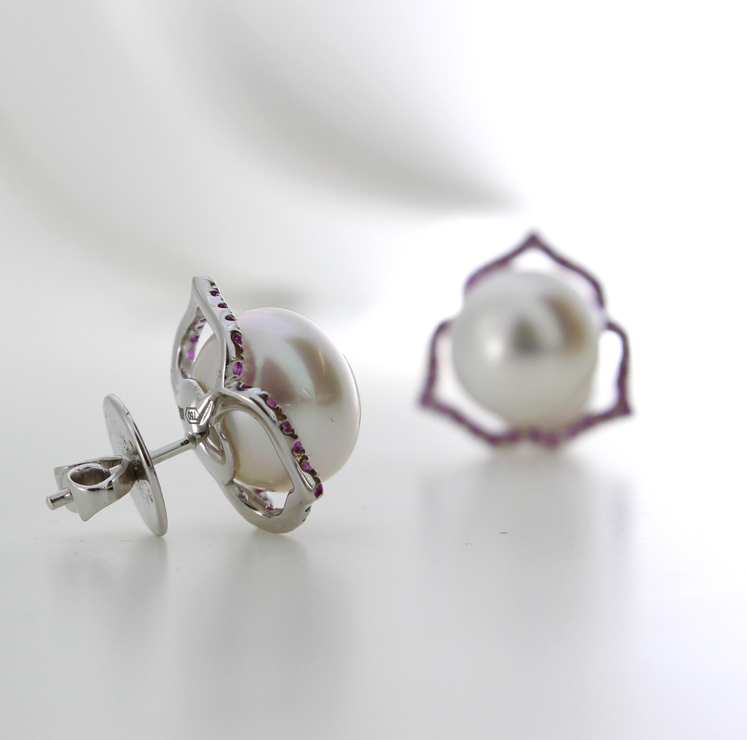 The 3 Point Stud Earrings are from the AUTORE Timeless Collection.
This piece is crafted in 18k White Gold with Pink Sapphires (0.432ct Brilliant Cut) with 12mm High Button White South Sea Pearls. 