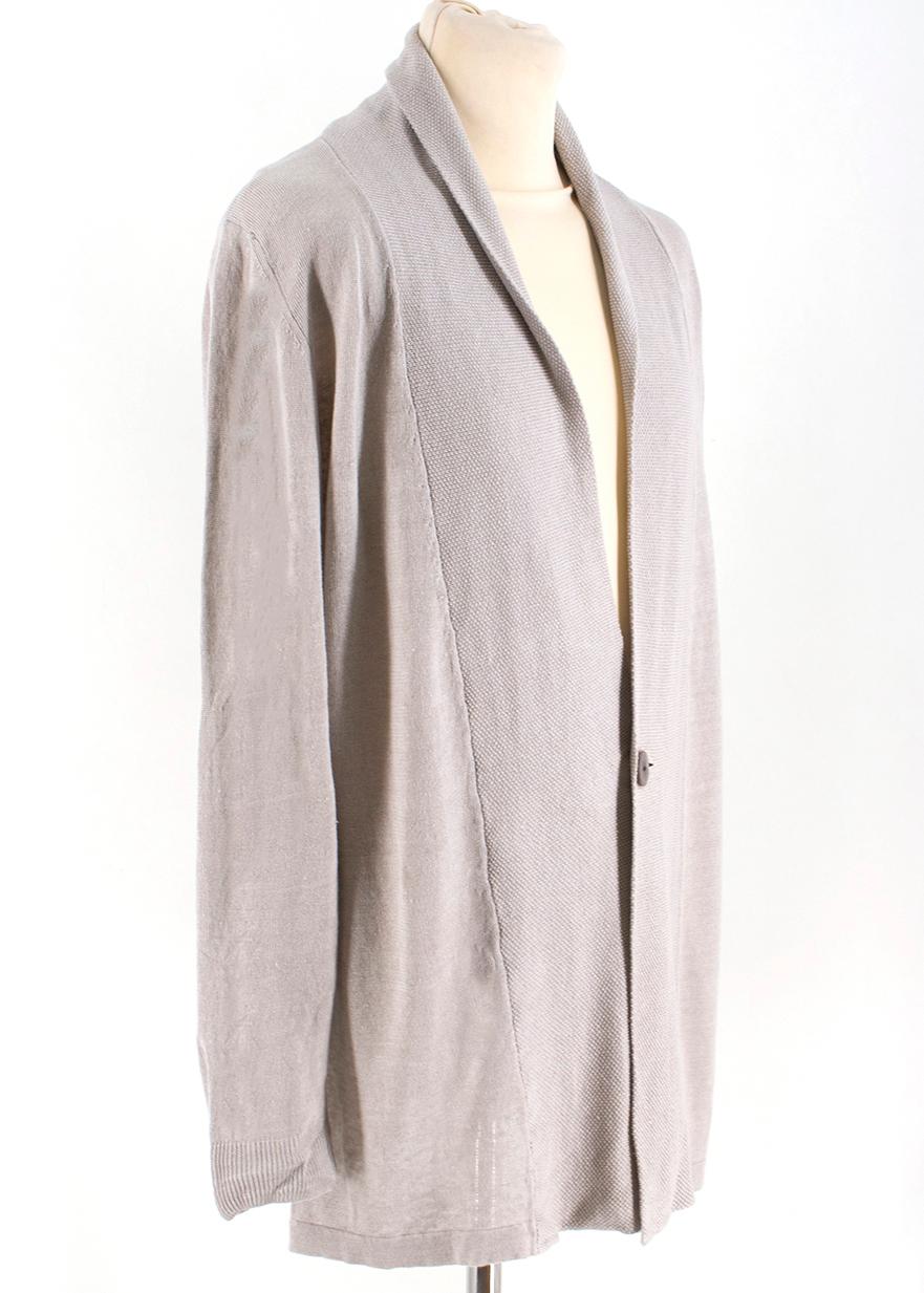 Autori Capresi Beige Knit Shawl Neck Cardigan 

- Beige Knit Cardigan 
- 100% Linen 
- Shawl neck, buttoned down center front 
- Long sleeved, ribbed edges 

Please note, these items are pre-owned and may show some signs of storage, even when unworn