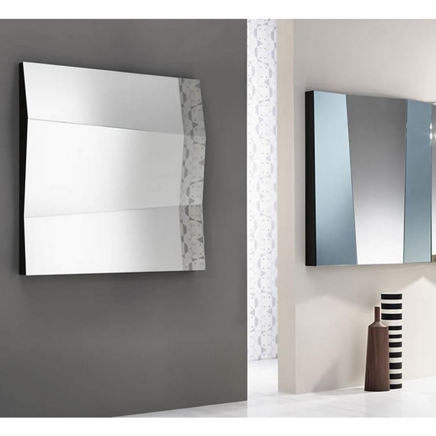 Big mirror surfaces at alternate inclination give the functionality a new aesthetic sense.
Designed by Giovanni Tommaso Garattoni

Made in Italy:
Made in Italy furniture means design, quality, style and sophistication.
The typical elegance of