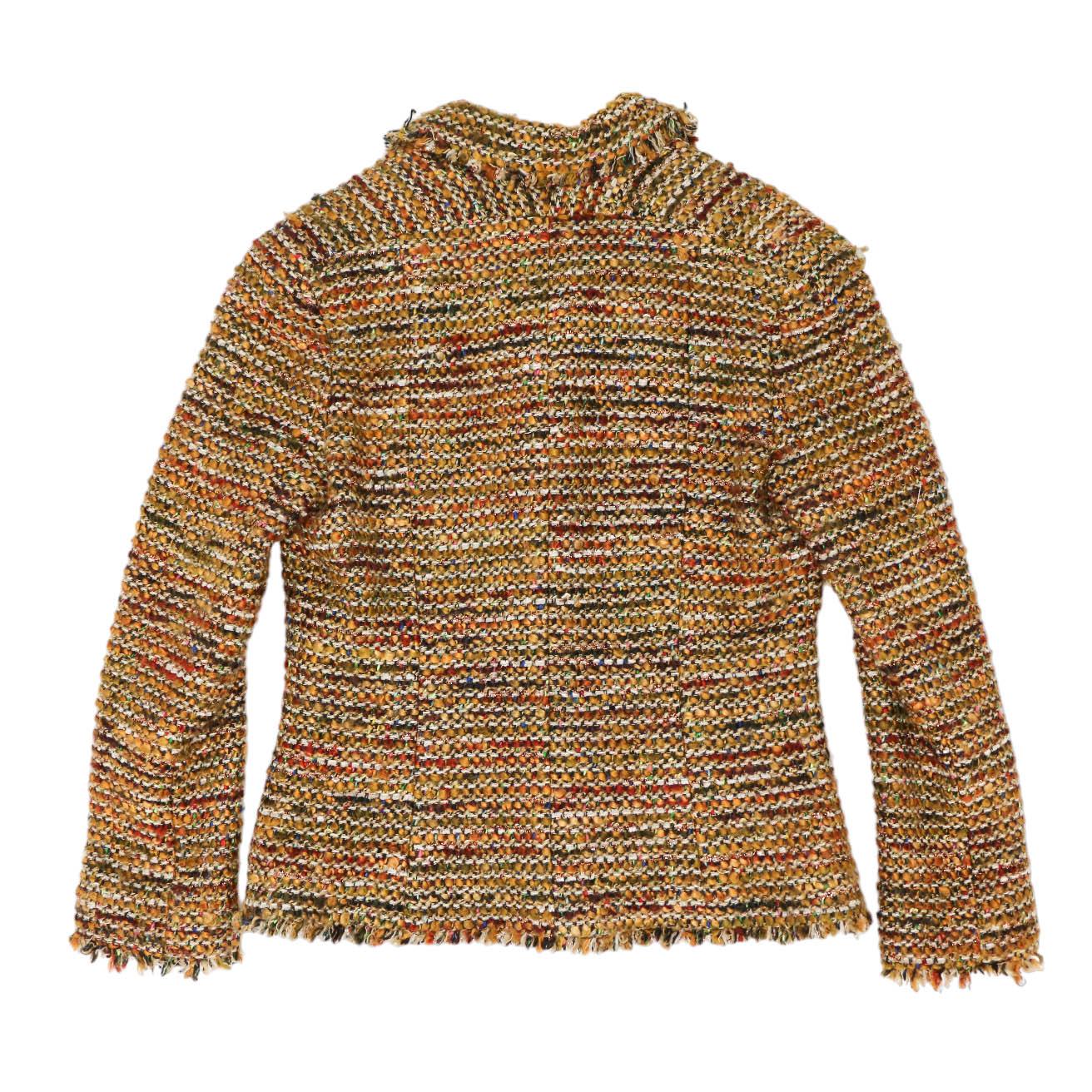 Stunning Chanel tweed jacket multicolored in autumn tones (brown, ochre...), in very good condition. Made in France, from the collection Autumn 2003.
Size : 42FR
Material : acrylic, tweed
Lining : brown silk
Dimensions flat: shoulders 42 cm,