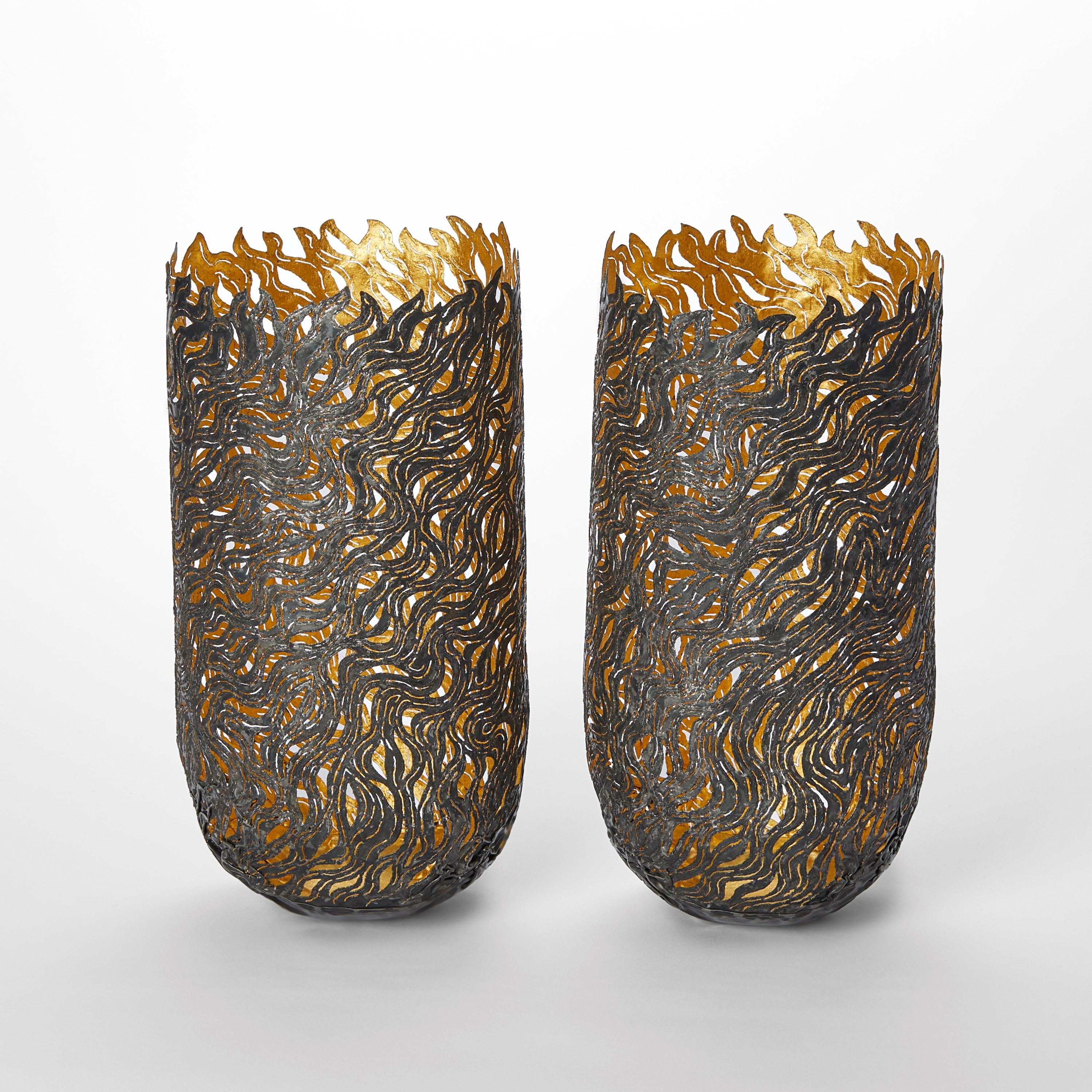 'Autumn Dance Vessels' are unique sculptural vessels by the British artist, Claire Malet, created from recycled and reformed steel cans with 24 ct fairmined gold leaf.

Price and dimensions shown per artwork.

Malet is an artist who works with