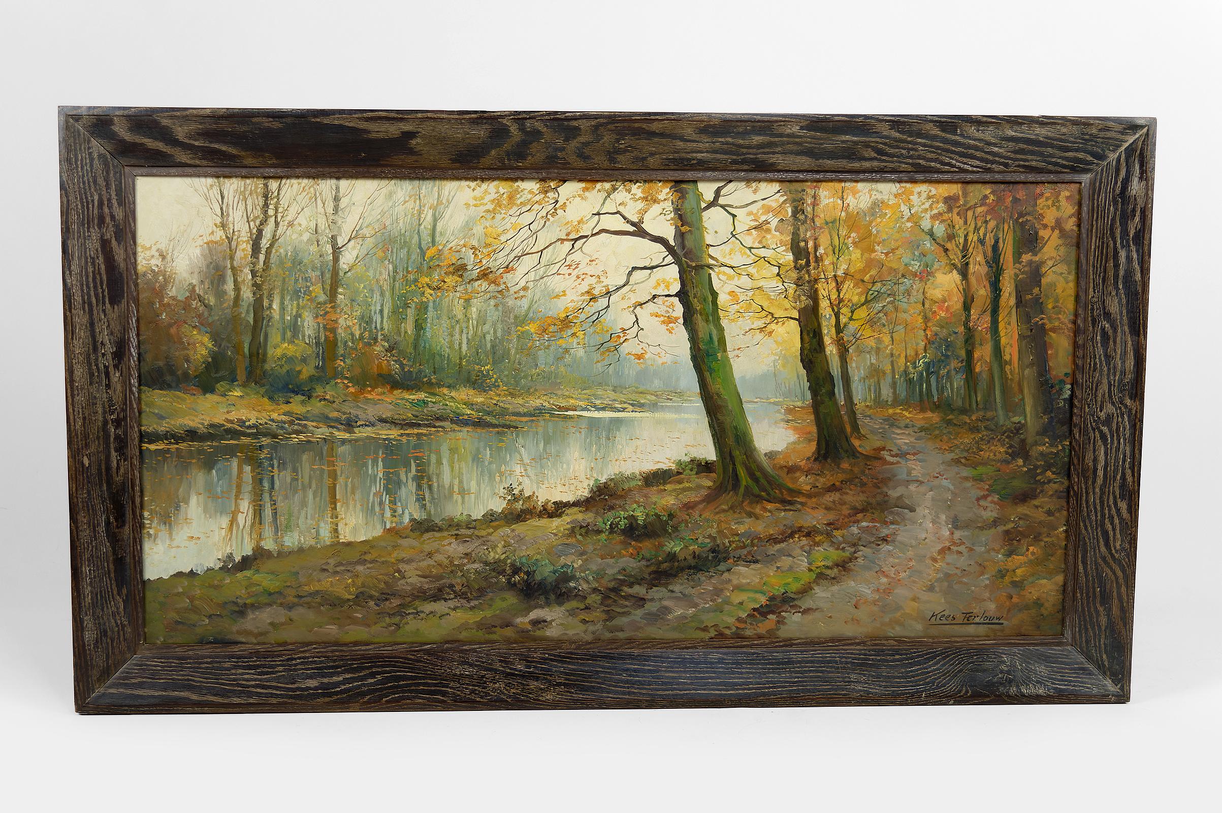 Superb and large framed canvas/painting depicting an autumn landscape: we see a walk / towpath in the forest, lined with trees losing their leaves, and along a stream. The trees on the other bank are reflected in the river/canal.

By Cornelius Kees