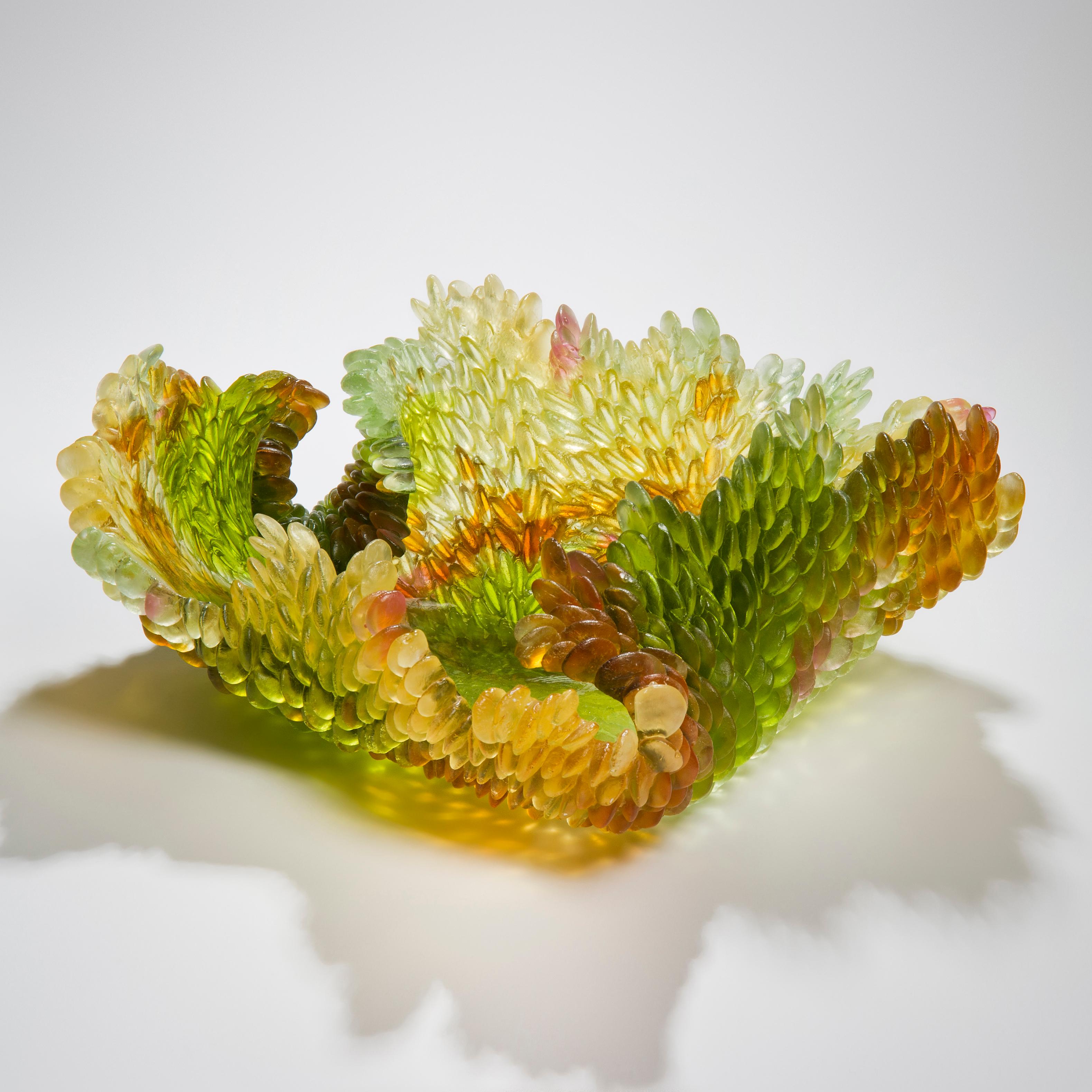 Autumn leaf is a unique textured glass sculpture in amber, green and yellow by the British artist Nina Casson McGarva.

Casson McGarva firstly casts her glass in a flat mould where she introduces all of the beautifully detailed, scaled surface