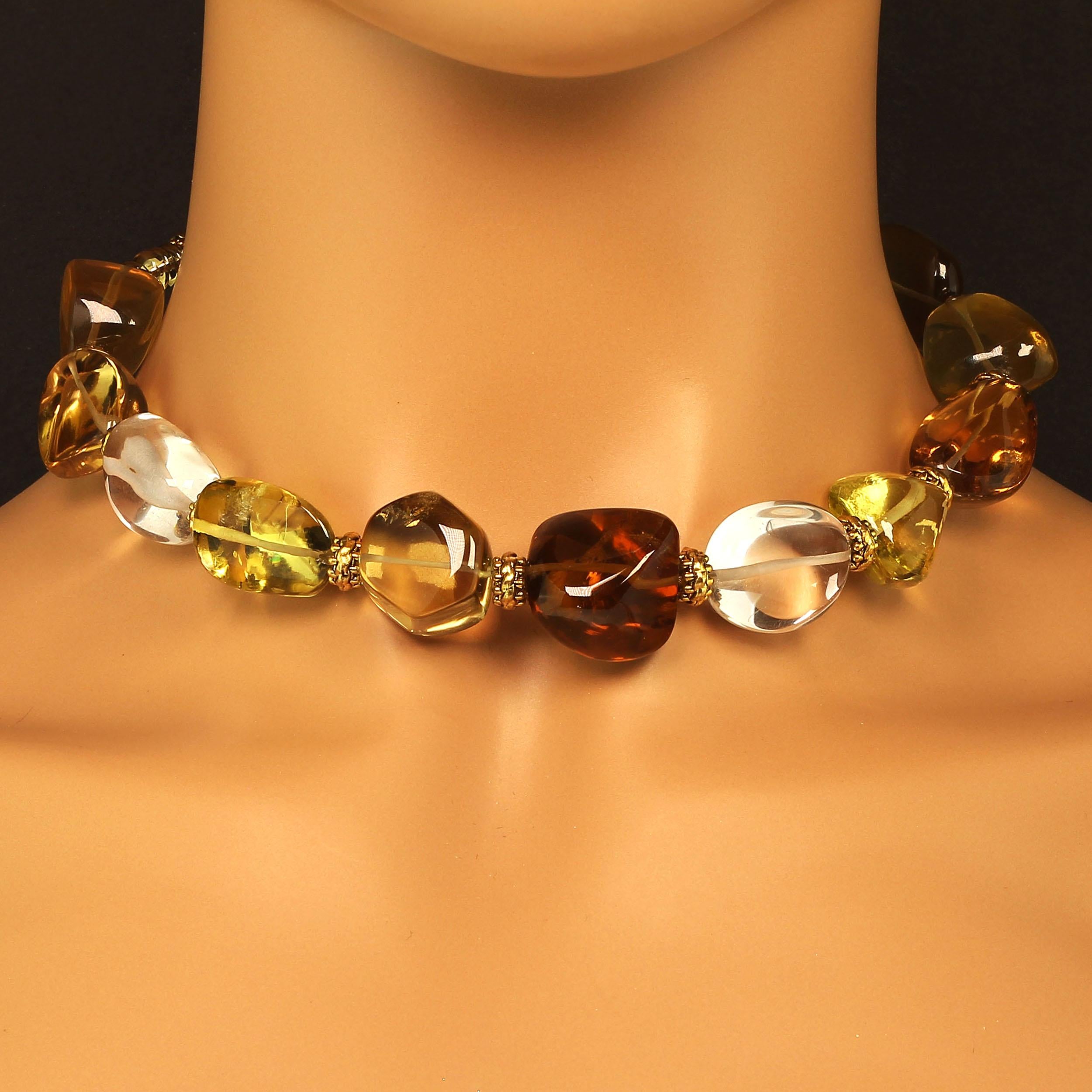 Handmade, highly polished Quartz Nugget necklace in Autumn tones.  These large free form nuggets, ave 20x18MM,  are glowing shades of green, tan, bronze, and clear Quartz.  They are enhanced with bronze tone Bali beads and smoky quartz. Smoky Quartz