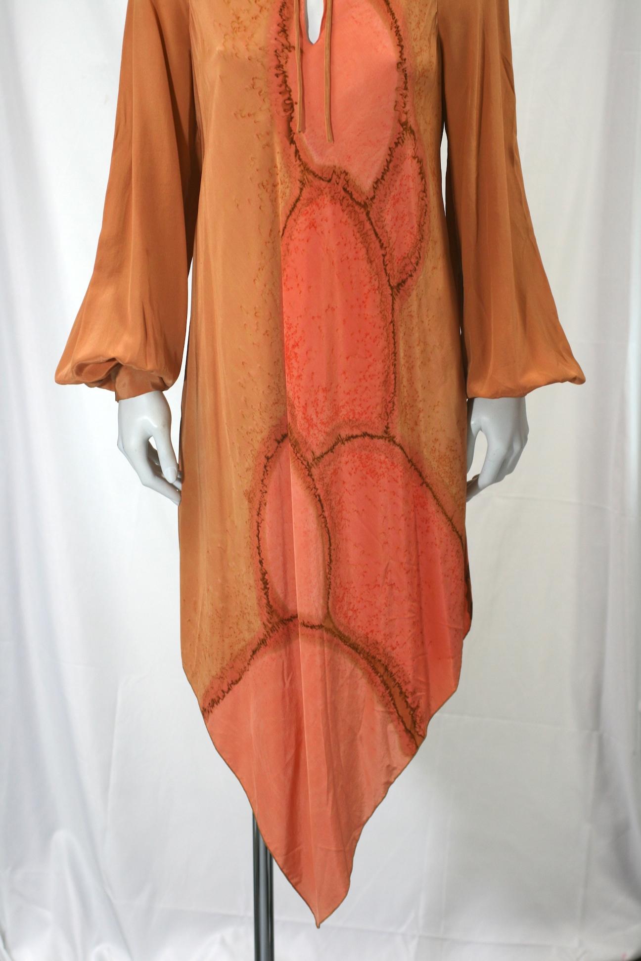 Autumnal tie dye silk crepe dress with provenance personal wardrobe of actress Lillian Gish.  Hand dyed on a rusty beige ground  with abstract lozenge patterns in varied shades of pale orange, rust and peach.  Self ties at neck with long full bishop