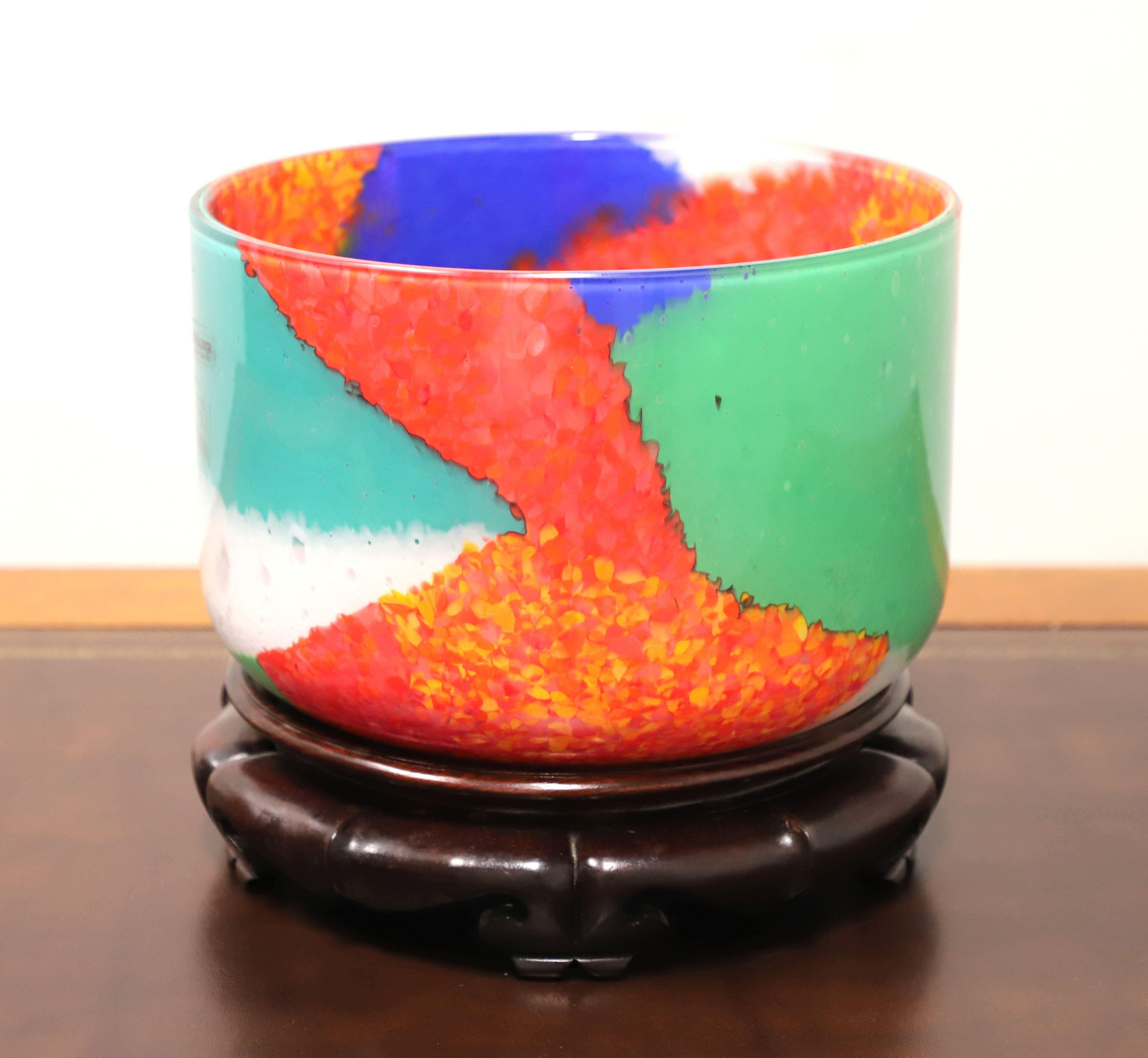 A Late 20th Century decorative Murano glass centerpiece bowl with stand by AV Mazzega. A beautiful multi-color Murano blown glass round bowl with a distinctive swirl texture to the colors, a smooth finish, and a separate decoratively carved round