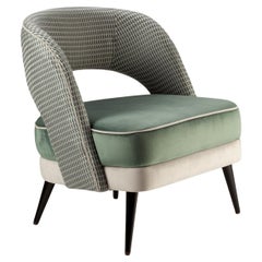 Fauteuil Ava avec assise verte souple et dossier à motifs vert olive