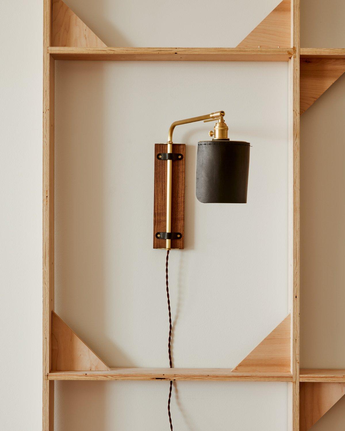Modern Brass + Walnut Ava Sconce in Black Leather, Plug in In New Condition For Sale In Philadelphia, PA