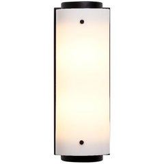 Available Now- XS Sconce in Brass or Powder Coated Black with White Lucite Shade