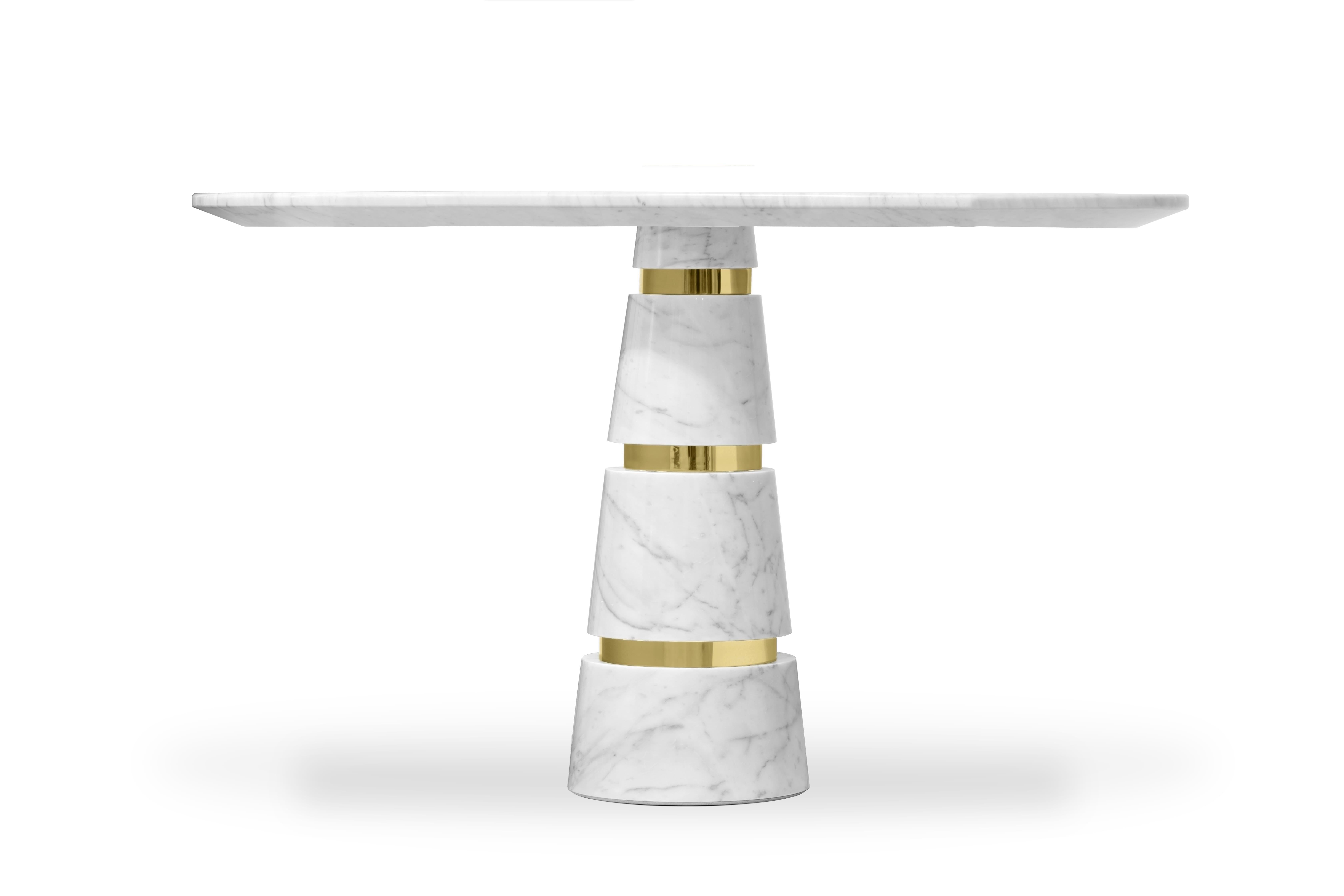 Minimalistic design and minute details, like the glamorous silver bands on the Avalanche leg, bring the Avalanche Dining Table speeding into the future. The broad white marble tabletop reminds you of your life of luxury, while the abstract,