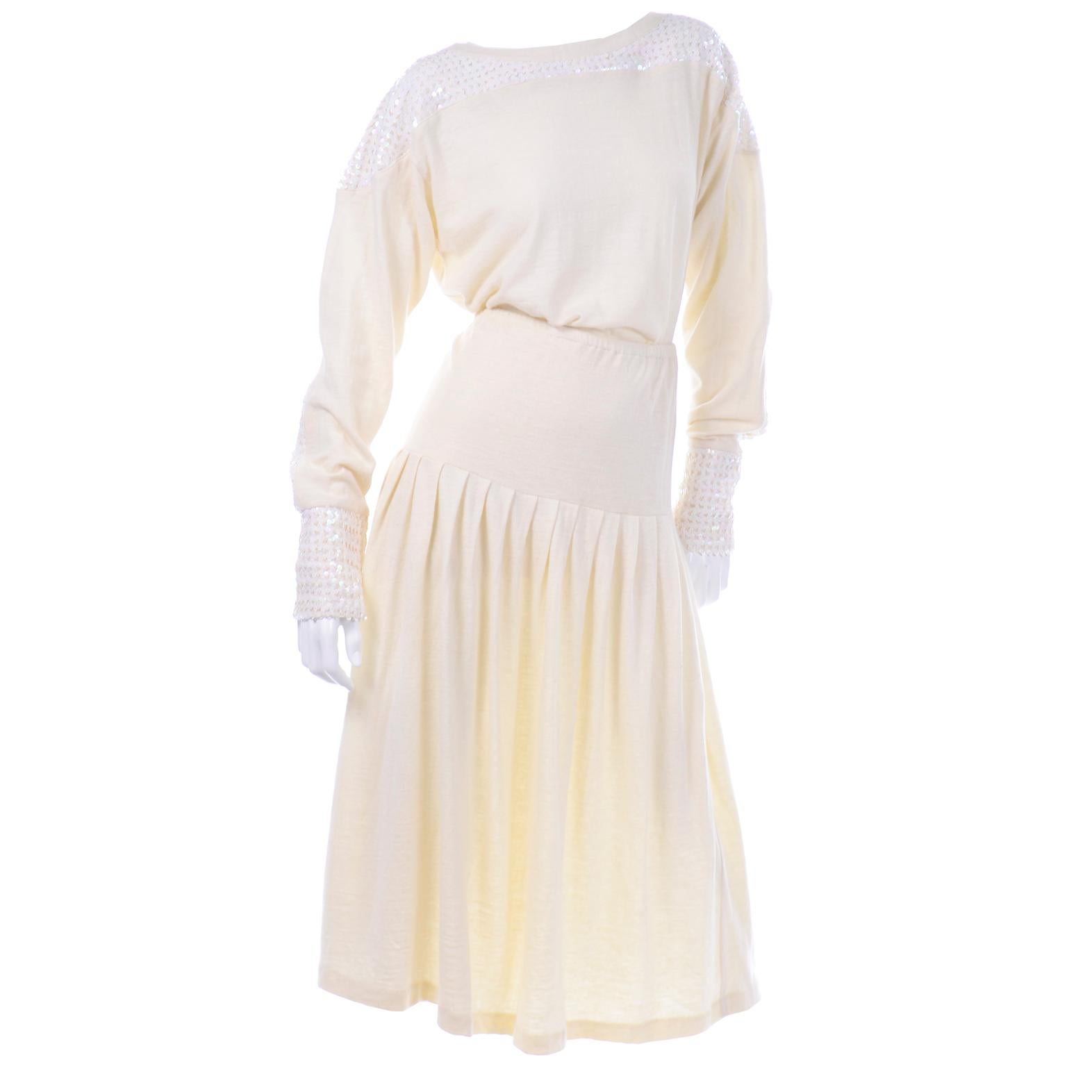 This outstanding vintage avant garde Gene Ewing ensemble came from an estate we acquired that included some of the best designers from the 1970's and 1980's. This outfit has the rare white Gene Ewing label and is made of creamy winter white 50%