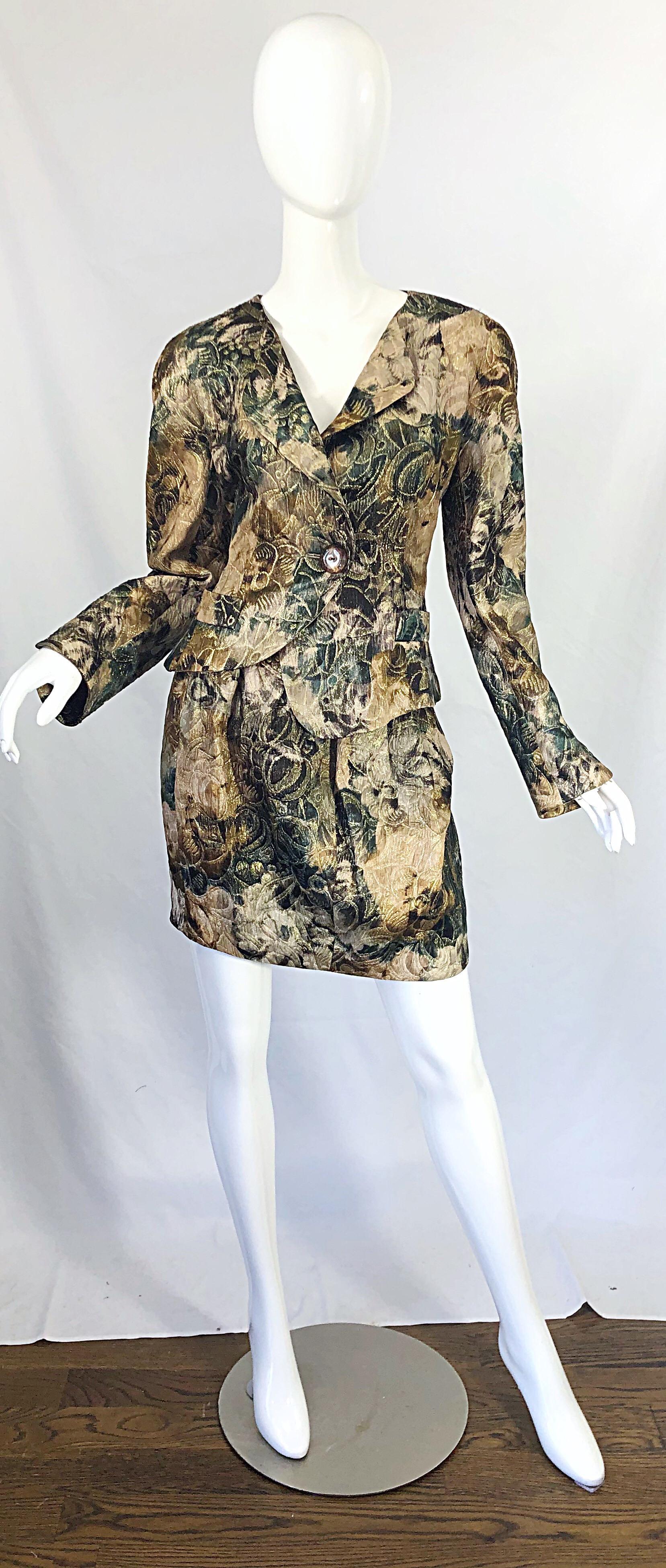 Avant Garde early 90s KRIZIA asymmetrical silk skirt suit ! Features warm hues of hunter green, brown, tan and ivory throughout. Asymmetrical hem on the jacket and each collar. Single button closure with snap. High waisted mini skirt has hidden