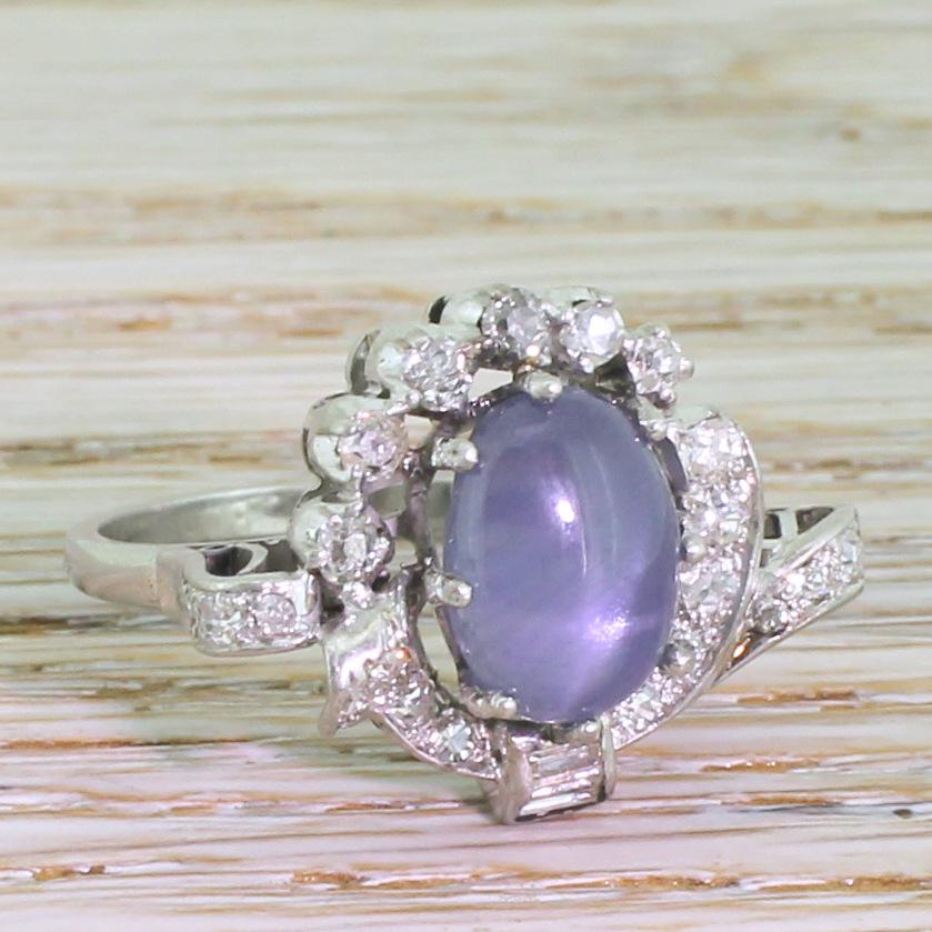 Avant Garde 7.63 Carat Ceylon Star Sapphire and Diamond White Gold Ring In Good Condition For Sale In Essex, GB