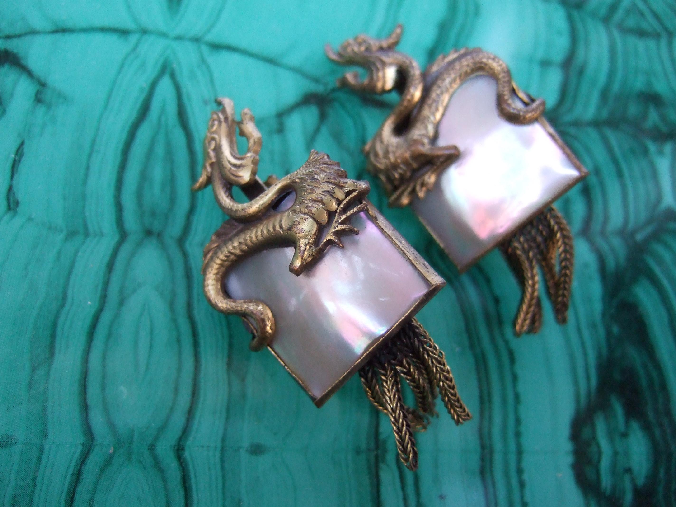 Avant-garde Brass Mother of Pearl Dragon Design Clip-on Earrings c 1960 In Good Condition In University City, MO