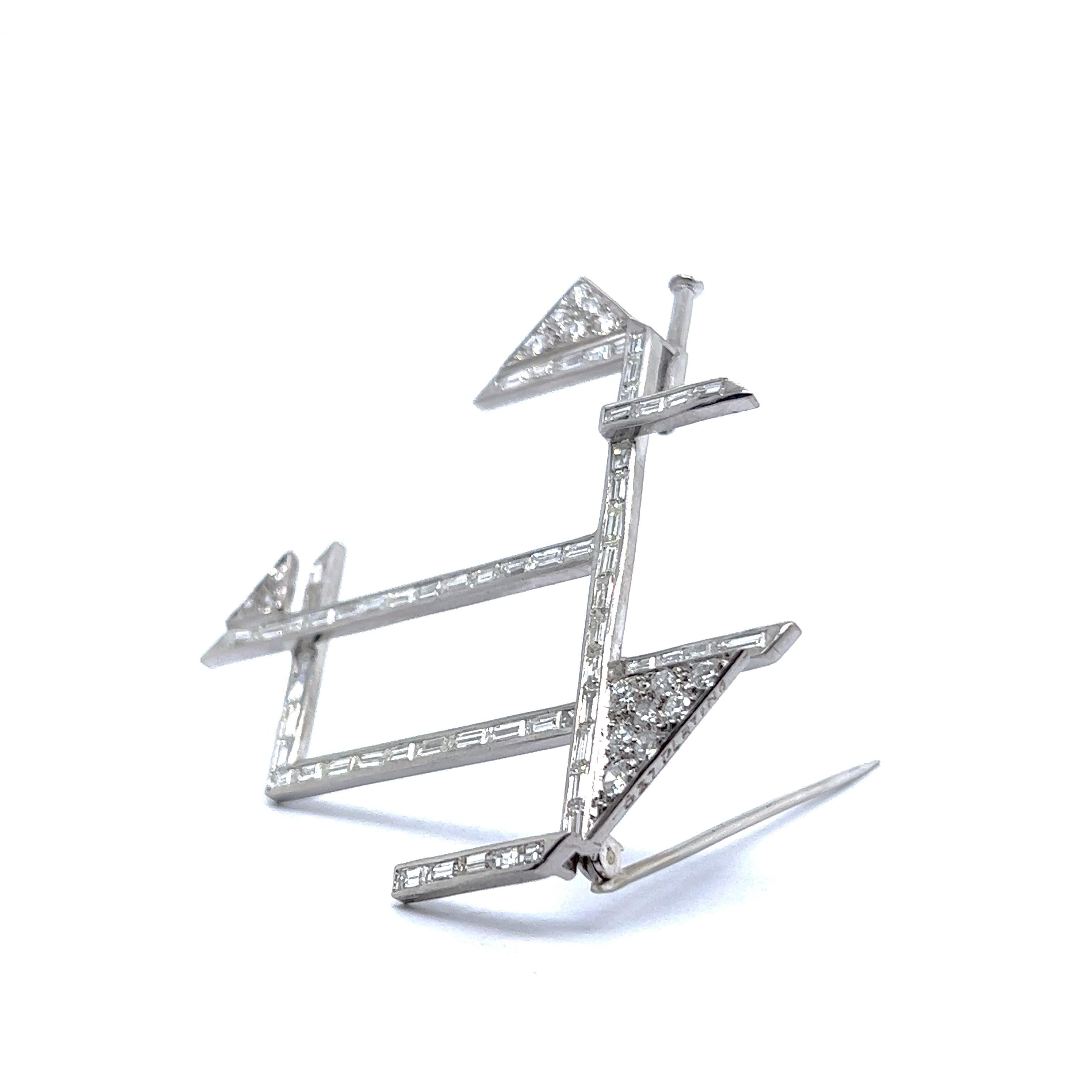 Introducing an exquisite geometric brooch in platinum with diamonds,  that embodies the essence of modernism. Drawing inspiration from the works of Kandinsky and the Bauhaus aesthetic, this jewelry piece seamlessly melds avant-garde elements with