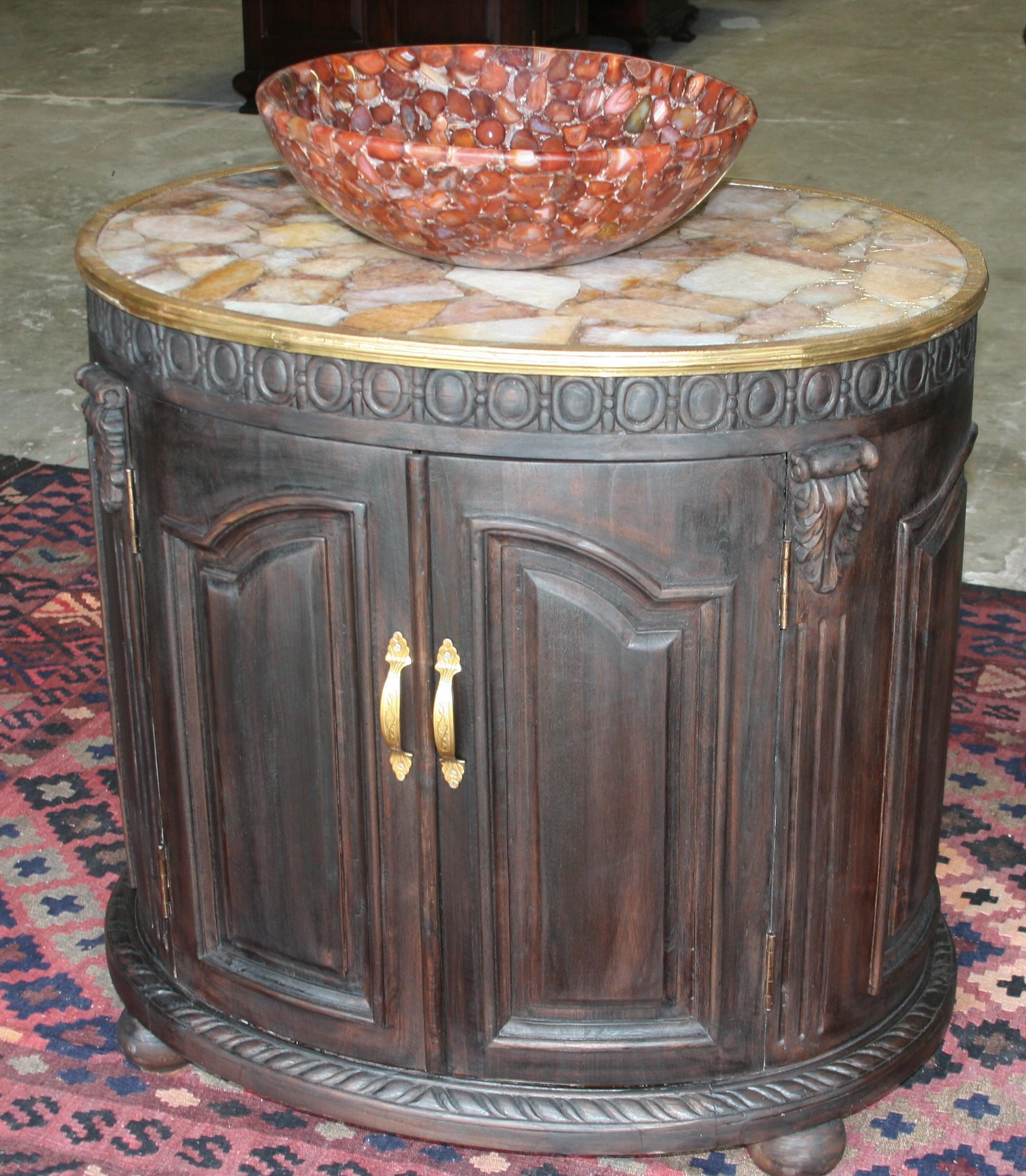 This extraordinary wedding gift was custom handcrafted and given as part of the gifts by the bride's family to the groom.
The vanity is made of hand carved teak wood with inside painted in silver tone. The top of the vanity is a slab made of yellow