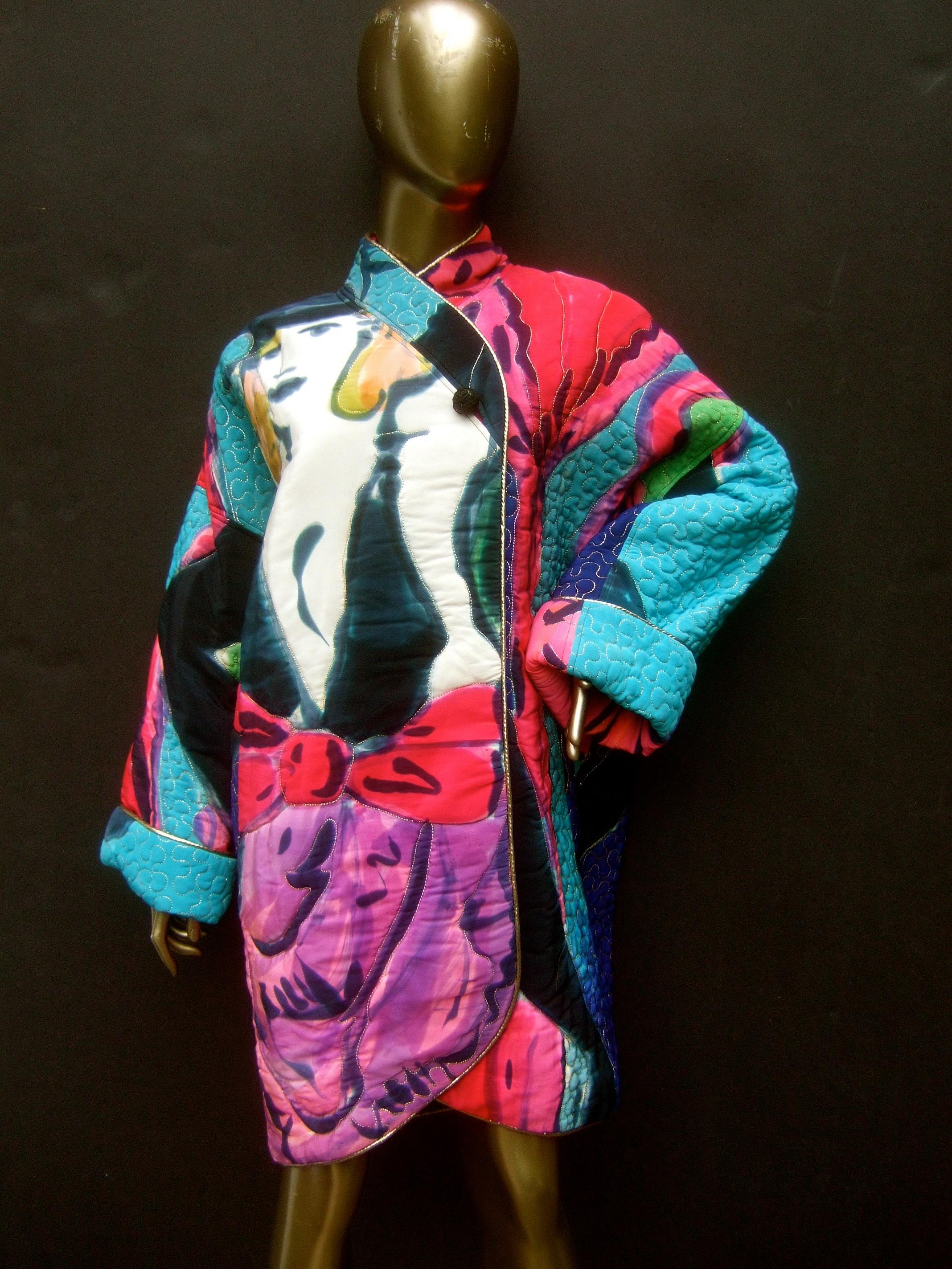 Avant-garde graphic silk quilted print artisan cocoon style boxy jacket designed by Michael Katz for Bergdorf Goodman c 1980s

The bold eye-catching graphic silk print jacket is a collage of pastel colors and designs. Illustrated with a pair of