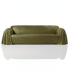 Avant-Garde Minimalist Sofa Ft. Cape-like Fabric Draped Over the Armrests