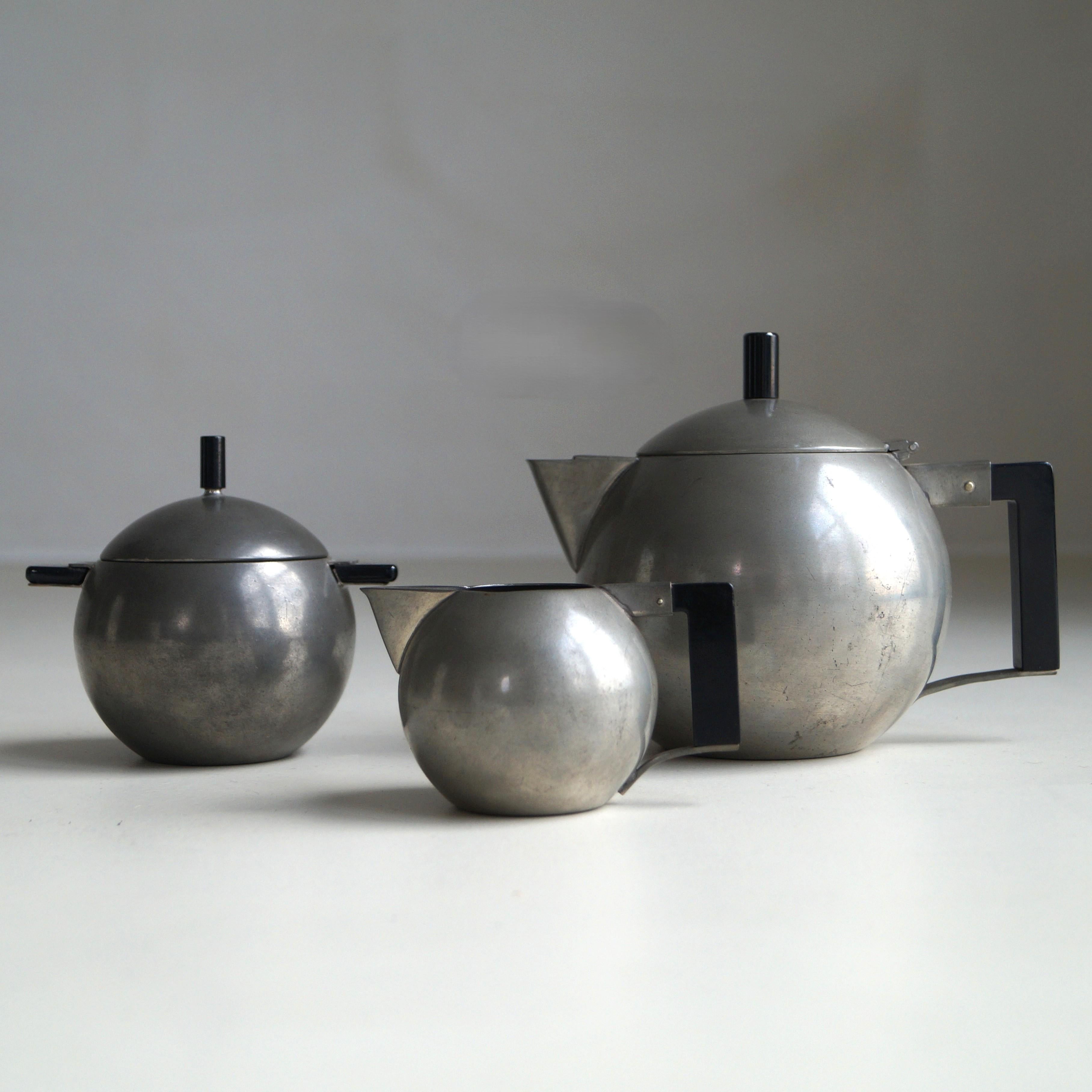 A modernist tea or coffee service, designed in the early 1920s by Chris van der Hoef. At the time a very radical avantgarde design. With its bold geometric forms and pure, spherical volumes, the design reflects the progressive ideals of the Bauhaus