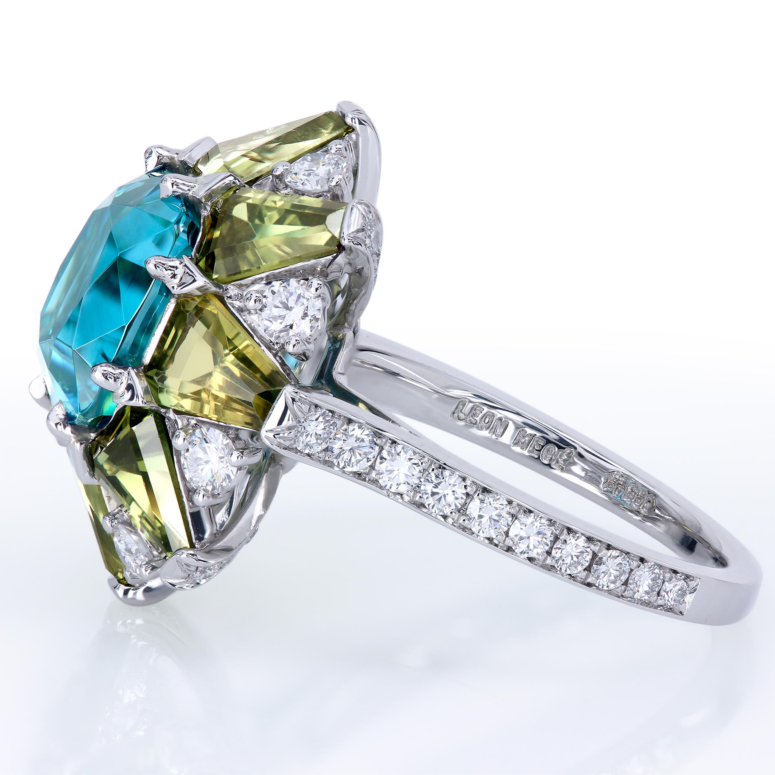 The ultimate right-hand ring with electric-blue 6.63-carat cushion zircon (irradiated) of astonishing intensity and brightness.
Surrounded by eight natural greenish-yellow sapphire baguettes and natural diamonds. Total diamond weight of 58 F-G/VS