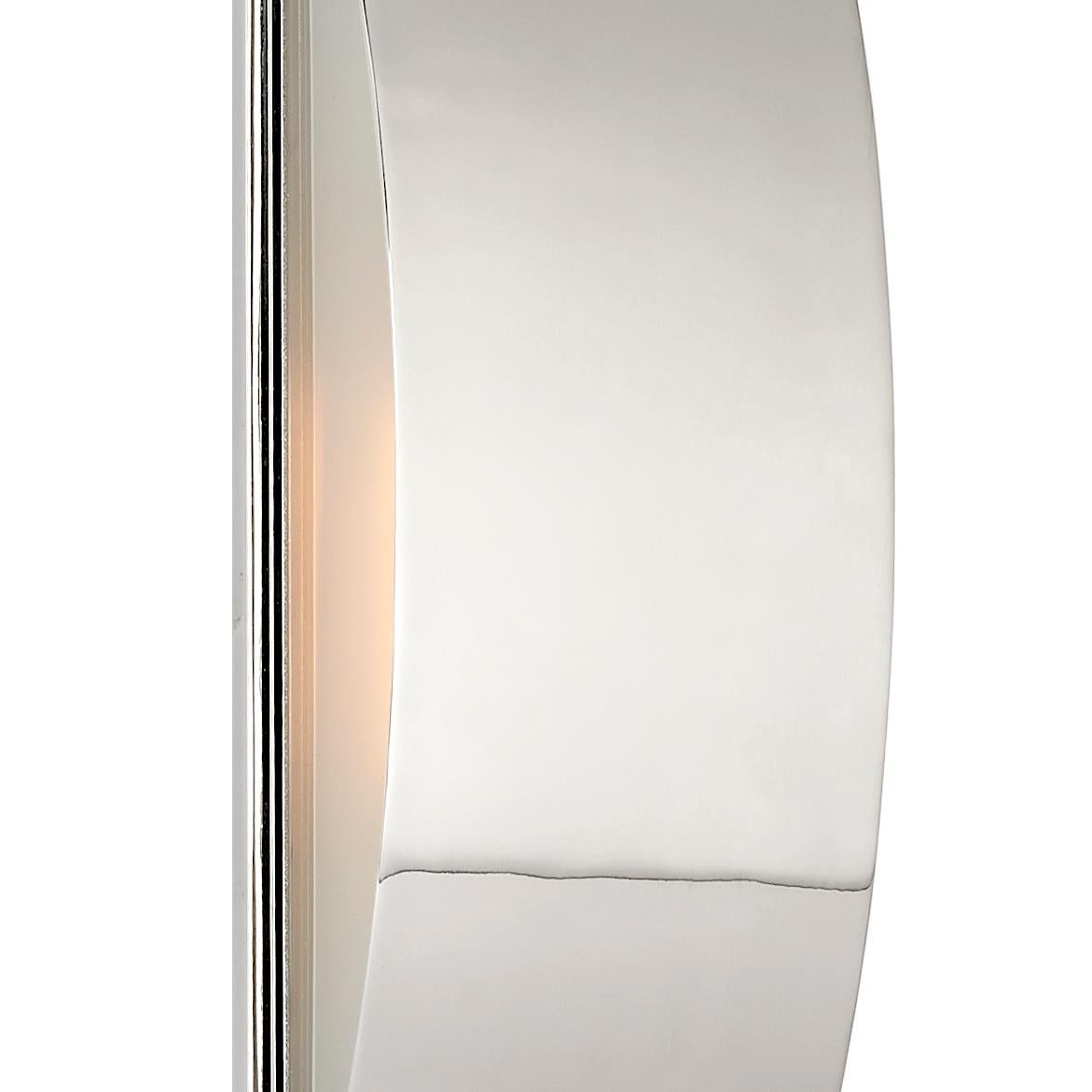 The Avant medium linear sconce emanates a simplistic modernism inspired by the pure interaction between line and curve. This linear sconce can be mounted both vertical or horizontal and is available in antique brass, bronze or polished nickel with