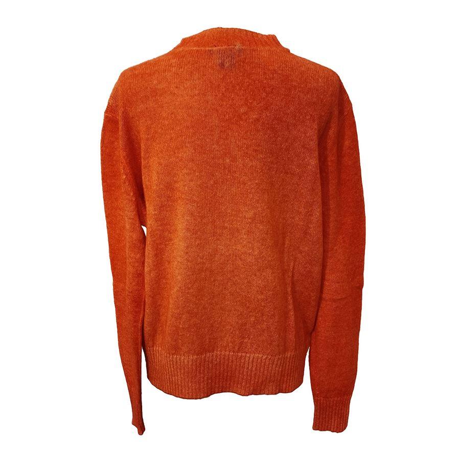 Alpaca wool (70%) and polyamide Orange color Round neck Shoulder/hem cm 58 (22,8 inches) Shoulder cm 50 (19,6 inches) Original price euro 500