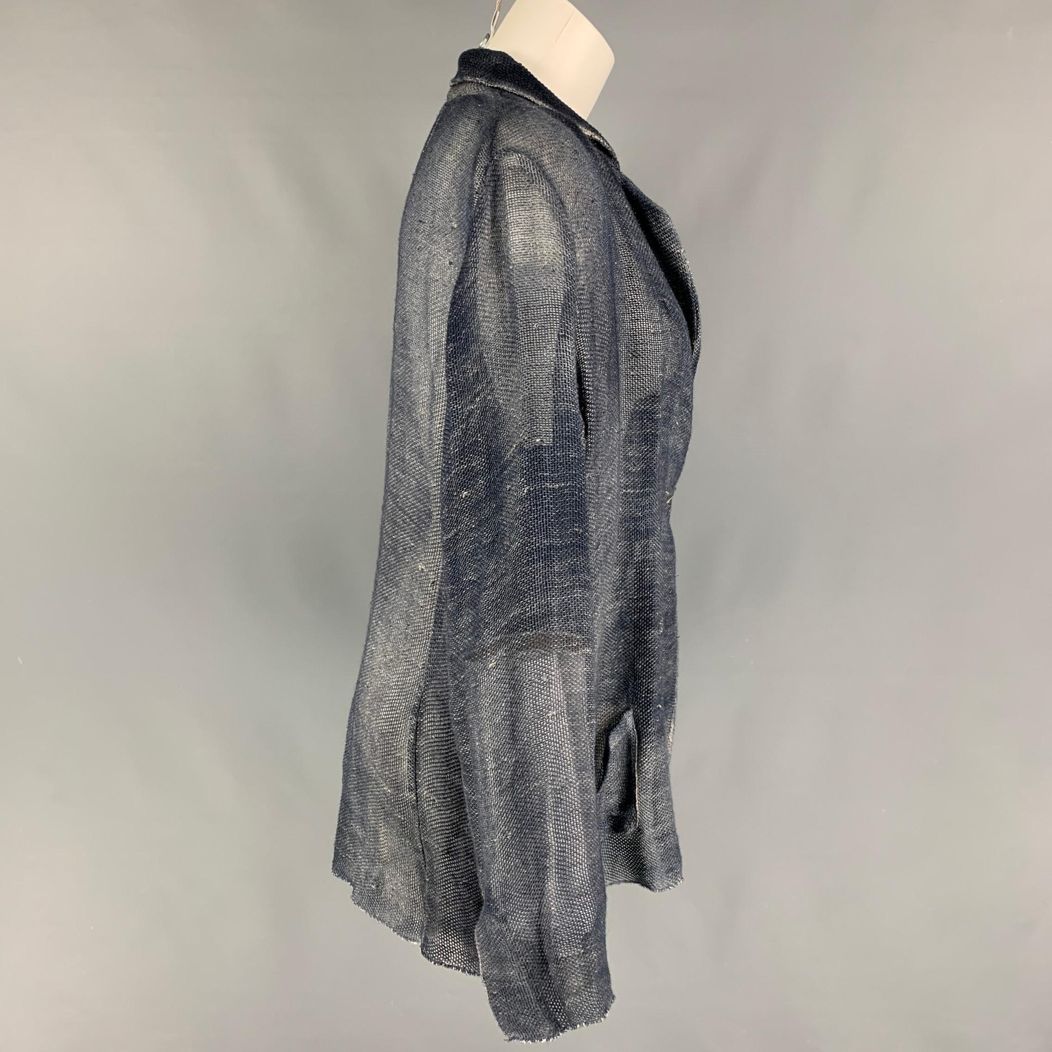 AVANT TOI blazer comes in a navy & grey linen / cotton featuring a notch lapel, front pockets, and a single button closure. 

Very Good Pre-Owned Condition.
Marked: M
Original Retail Price: $660.00

Measurements:

Shoulder: 15 in.
Bust: 40