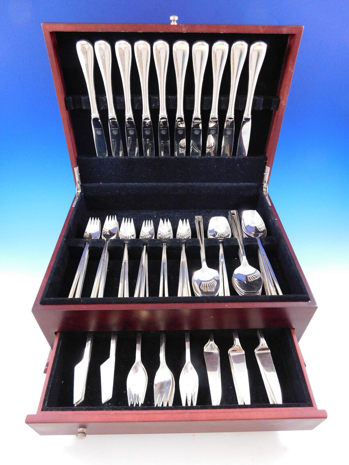 Mid-Century Modern Avanti by Codan Mexican sterling silver dinner flatware set with unique cut out handle design, 90 pieces total (including 10 dinner knives in another pattern). This set includes:

10 Dinner Size Knives, hollow rounded unadorned