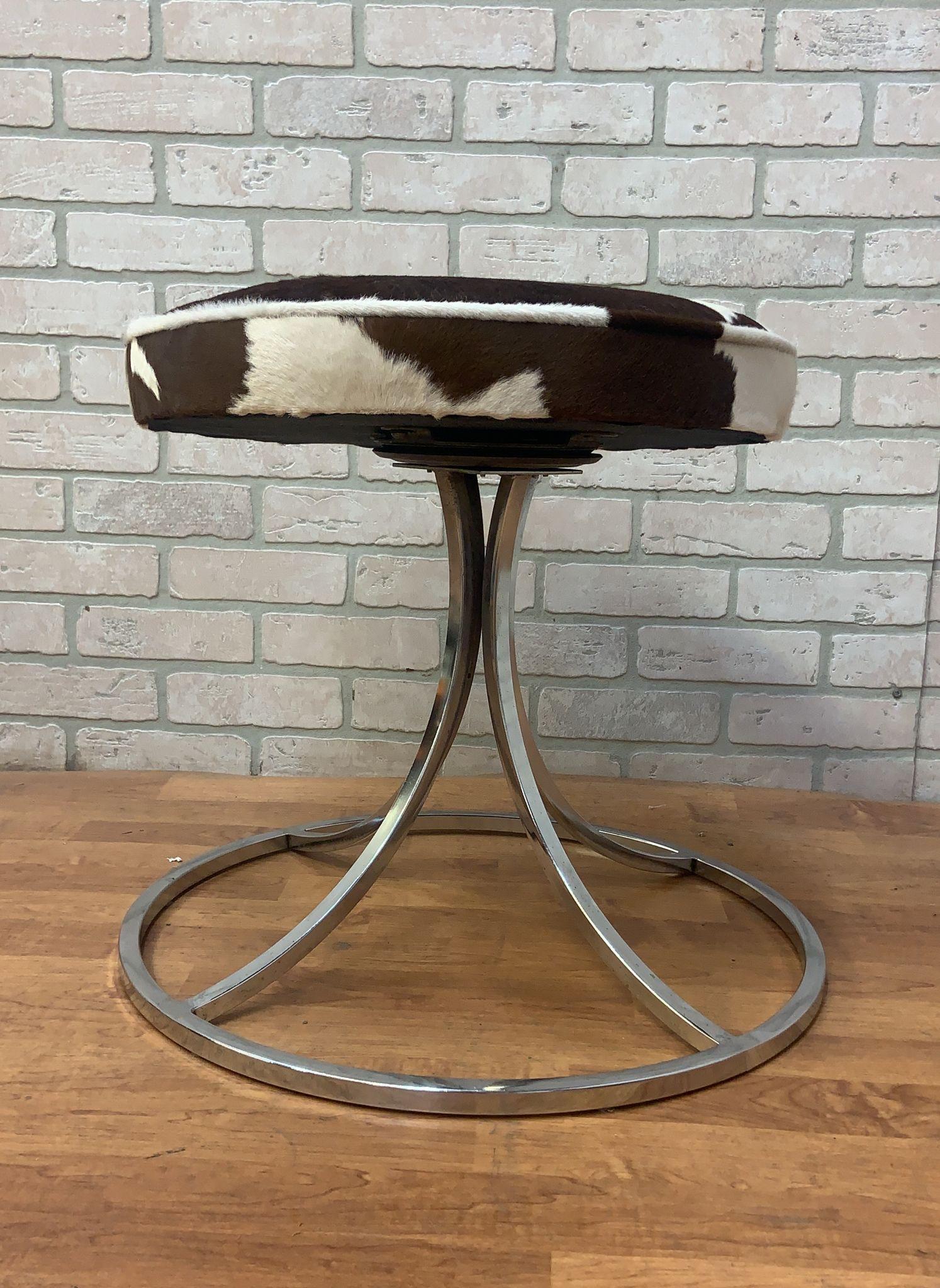 20th Century Avard Style Chrome Swivel Base Stools Newly Upholstered in Cowhide - Set of 4 For Sale