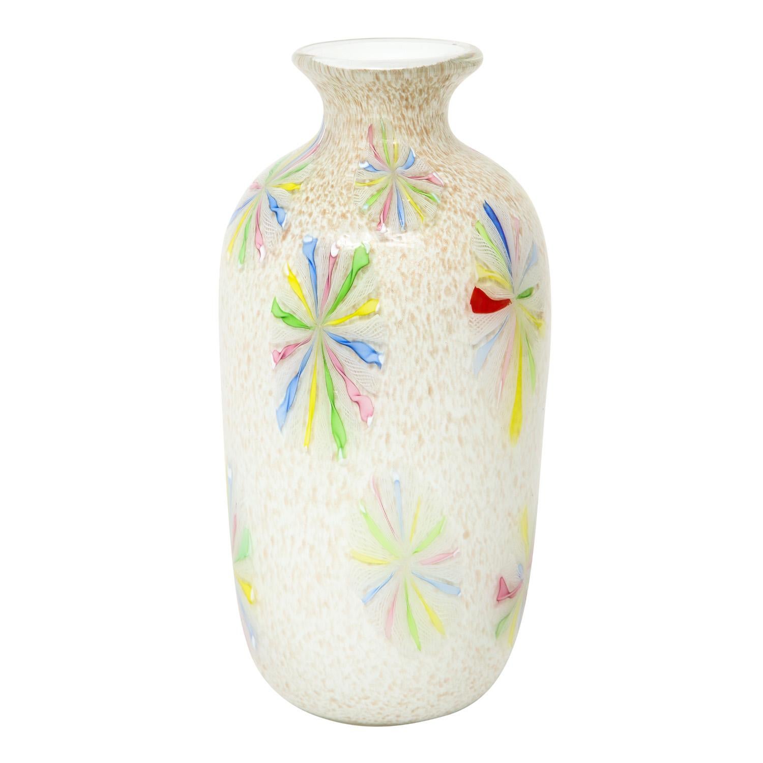 Hand-blown glass vase, colorful starburst murrhines over white glass with gold inclusions, by Arte Vetraria Muranese or A.V.E.M., Murano Italy, 1950's. This vase is like a jewel. The gold inclusions sparkle inside the glass.

Provenance: 
Evan