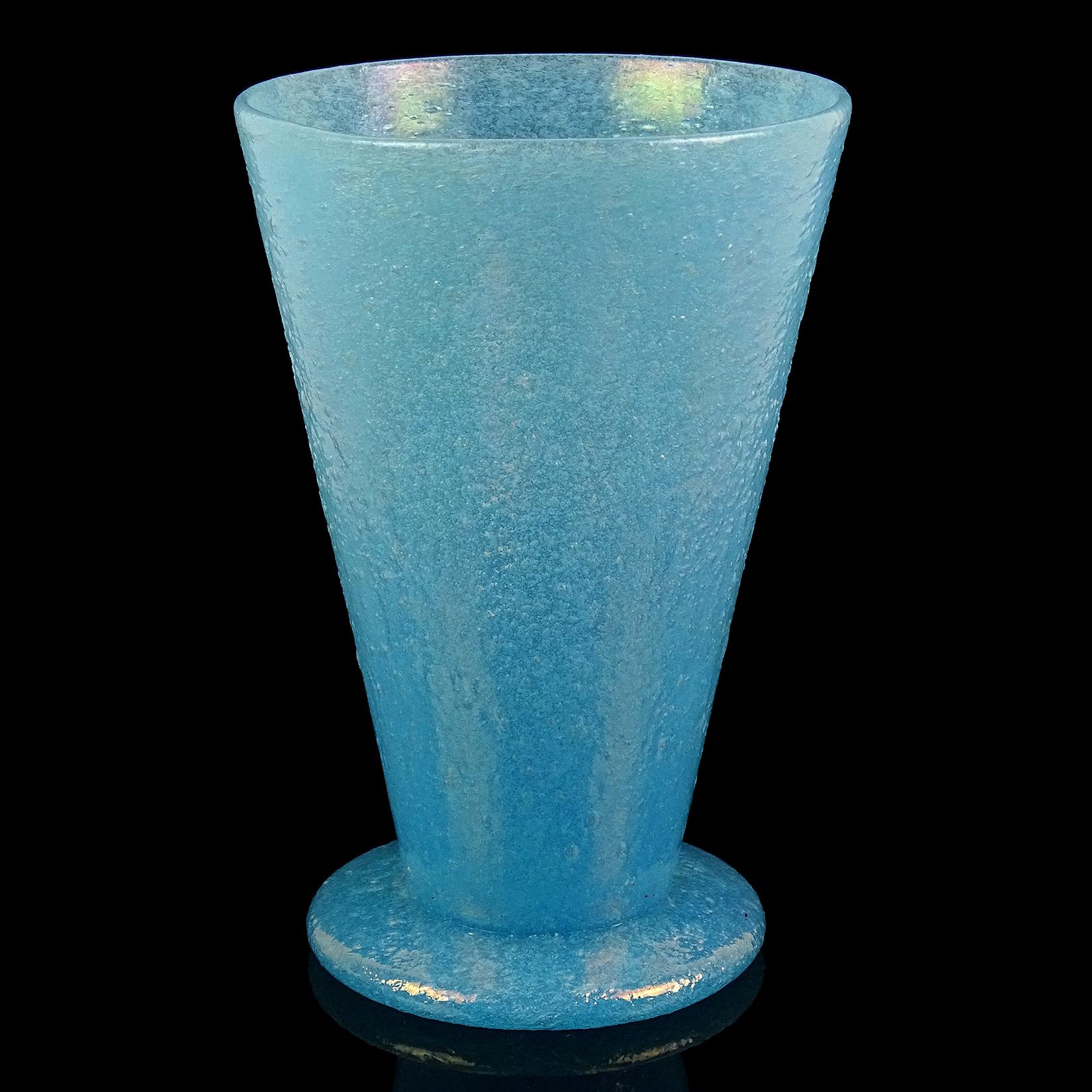 Beautiful antique Murano hand blown blue with slight iridescent surface Italian art glass flower vase with applied foot. Documented to the Arte Vetraria Muranese company (A.Ve.M.). It still retains an original, but worn, 