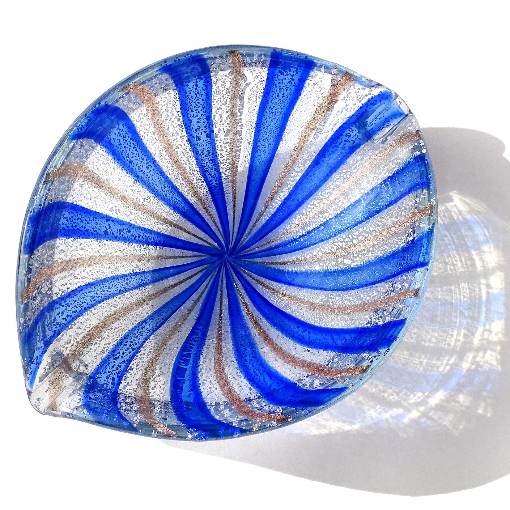 Beautiful vintage Murano hand blown blue, copper aventurine and silver flecks Italian art glass bowl. Documented to the A.Ve.M. (Arte Vetraria Muranese) company. The piece has alternating bands of cobalt blue and aventurine over silver leaf. It has
