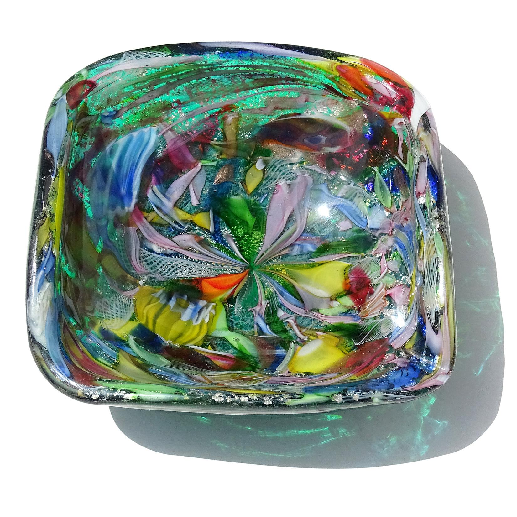 Beautiful vintage Murano hand blown green, silver flecks, copper aventurine, millefiori flower murrines and twisted ribbons Italian art glass bowl / ashtray. Documented to the A.Ve.M. (Arte Vetraria Muranese) company. The pattern is published in the