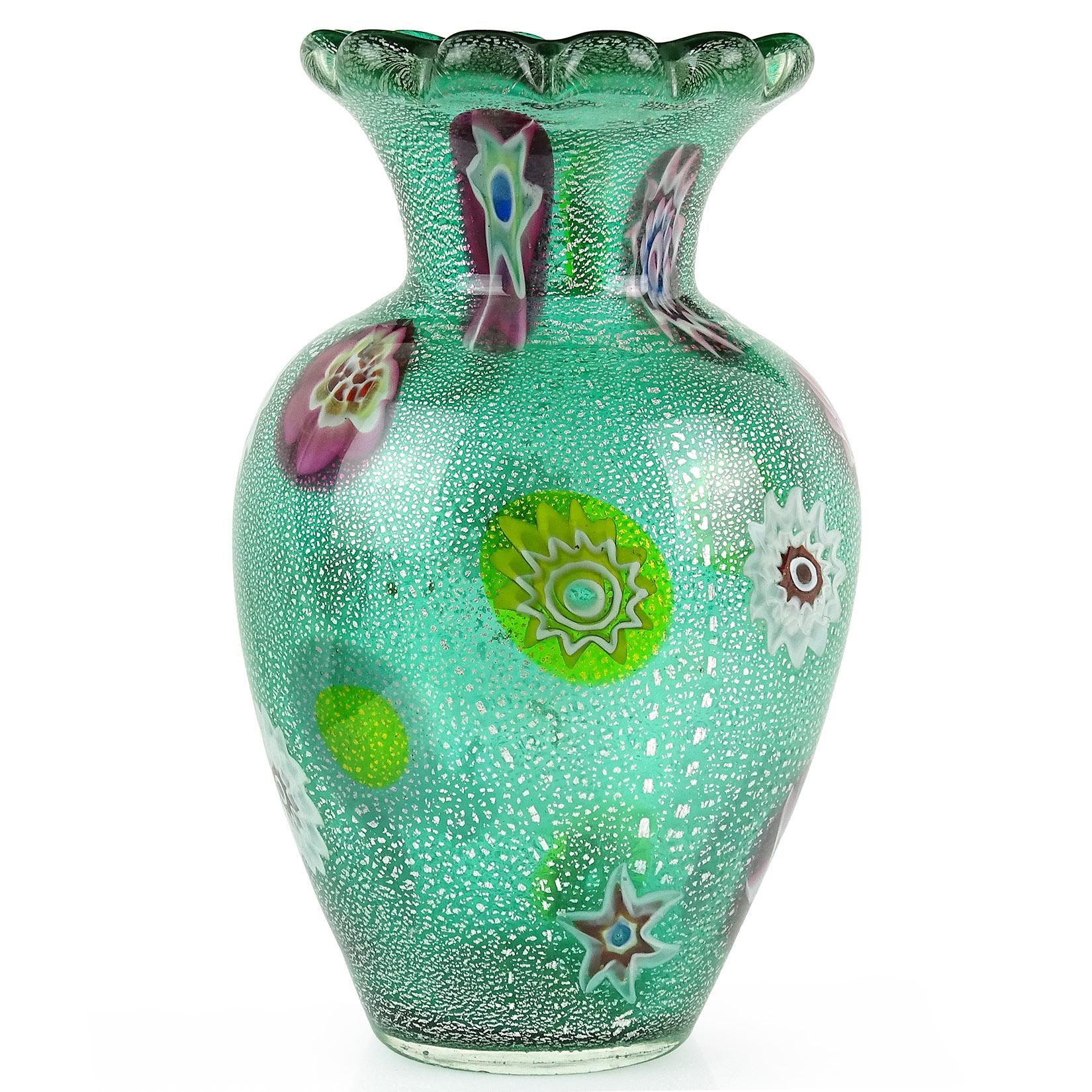 Beautiful vintage Murano hand blown green, silver flecks and large millefiori murrines Italian art glass flower vase. Documented to the A.Ve.M. (Arte Vetraria Muranese) company and attributed to designer Giulio Radi. Made of thick glass, with