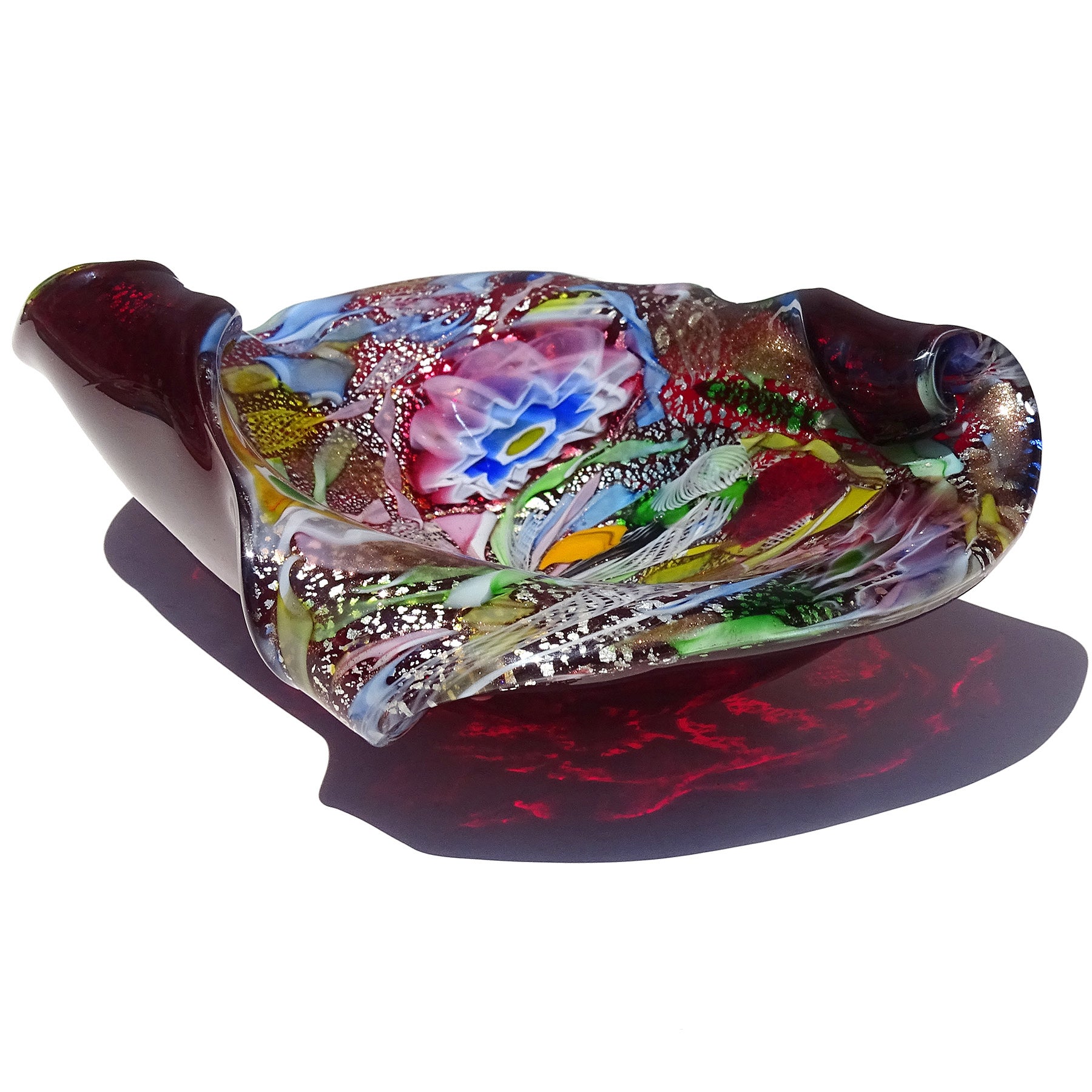 Beautiful and large, vintage Murano hand blown red, silver, copper aventurine, millefiori flower murrines and twisted ribbons Italian art glass center bowl. It is documented to the A.Ve.M. (Arte Vetraria Muranese) company. The bowl has a scissor cut