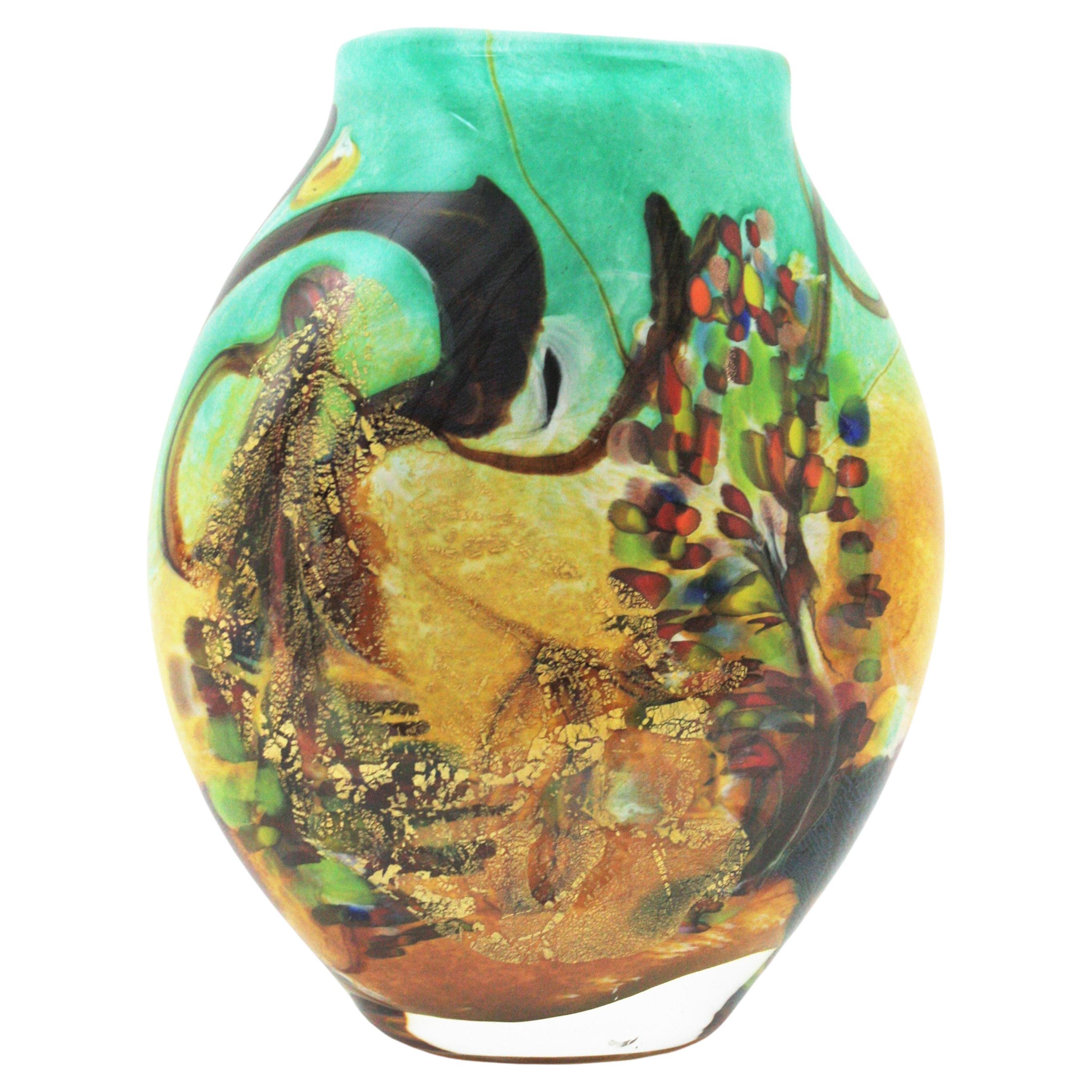 Hand blown Murano multicolor murrine art glass vase with gold leaf flecks. Attributed to Arte Vetraria Muranese (A.V.E.M.), Italy, 1950s.
Exquisite and sculptural handblown Murano glass vase with an eye-catching 'Tutti Frutti' design different from