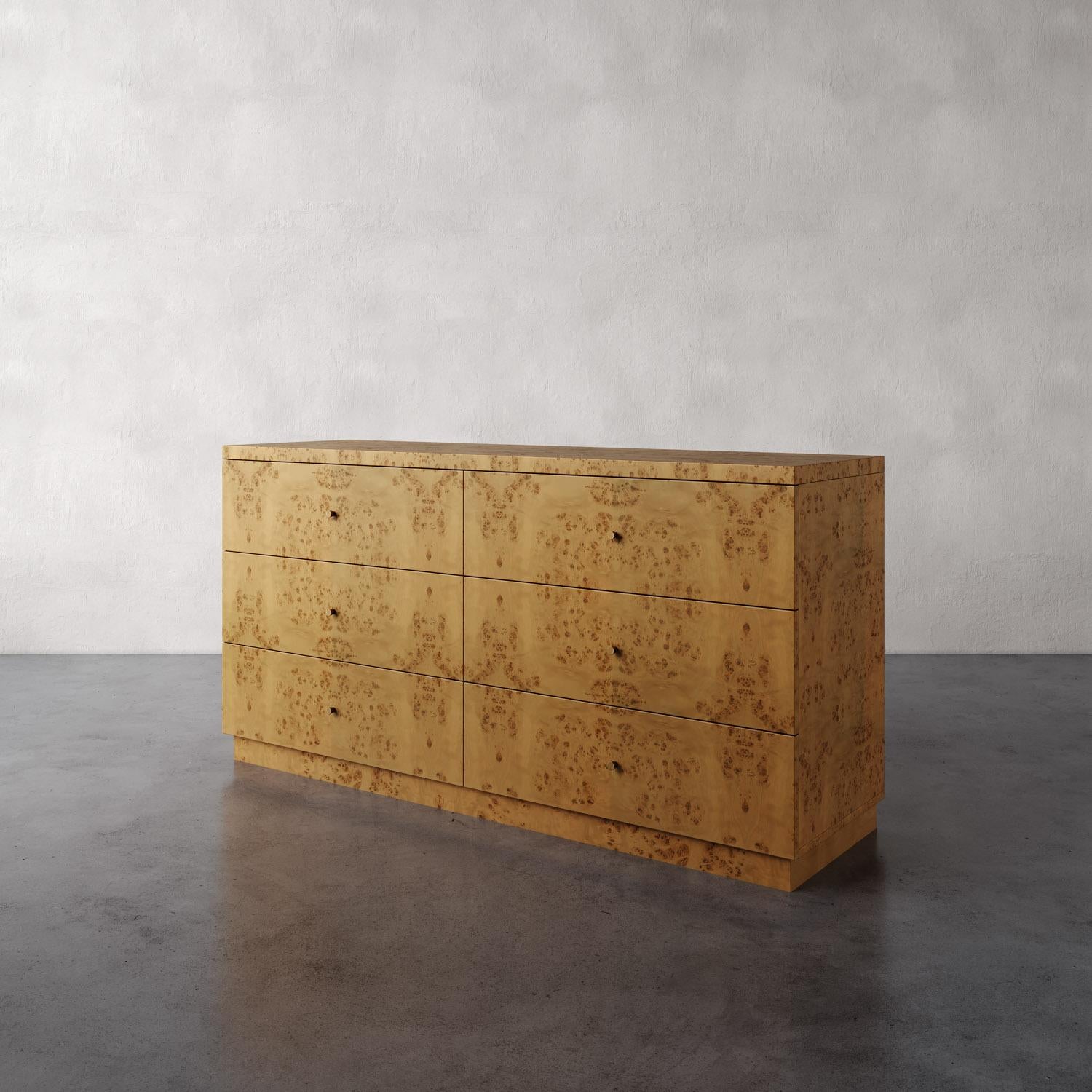 The Lemieux Et Cie Avenir Dresser in Mappa Burl seamlessly blends timeless beauty with functional design. Inspired by the refined simplicity of Milo Baughman and T.H. Robsjohn-Gibbings, this meticulously crafted piece showcases the natural beauty of