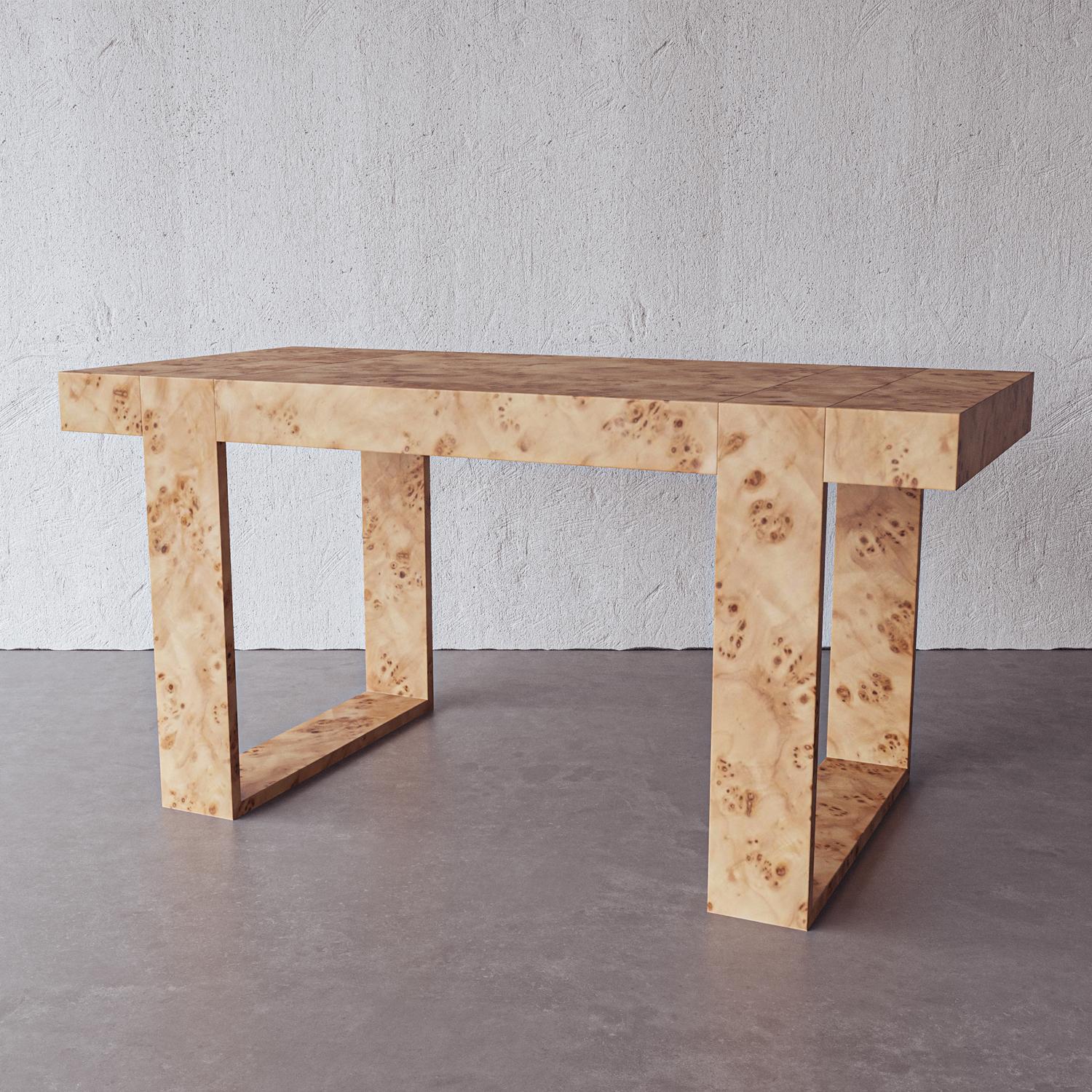 Clean lines, an open structure and natural Mappa burl wood compose a multi-functional desk for any home. The versatile scale works beautifully as a table, vanity or console. Handmade by artistans in Vietnam, this piece is complementary to a range of
