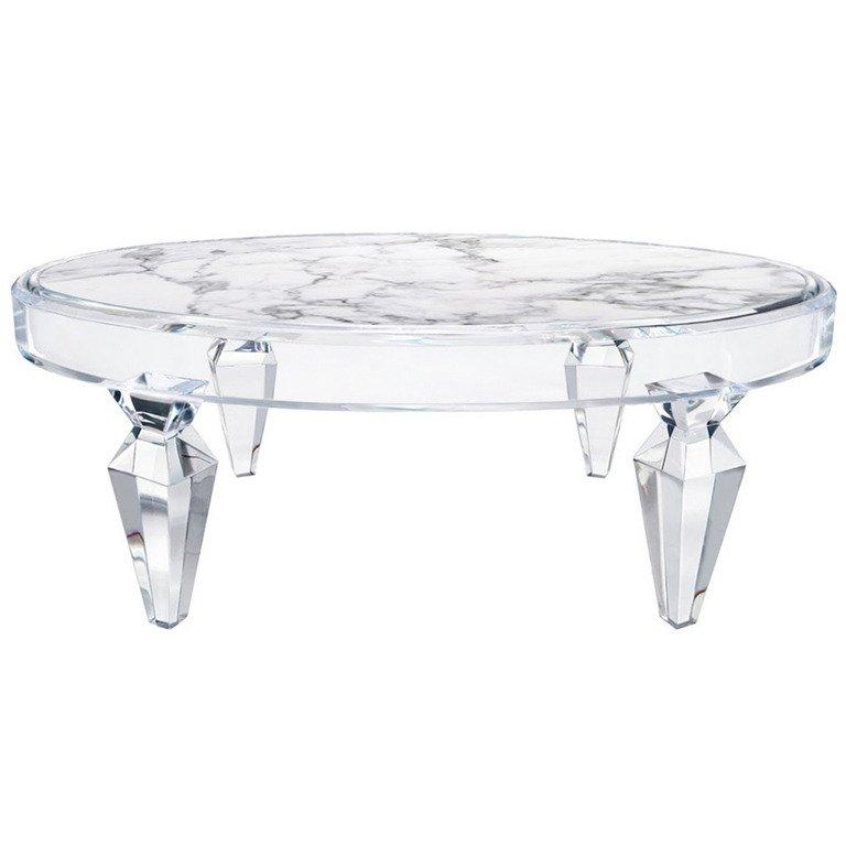 An oval Avenir coffee table with faceted legs and stone inset top by Craig Van Den Brulle. 

Made to order.

Lead Time:  12 Weeks