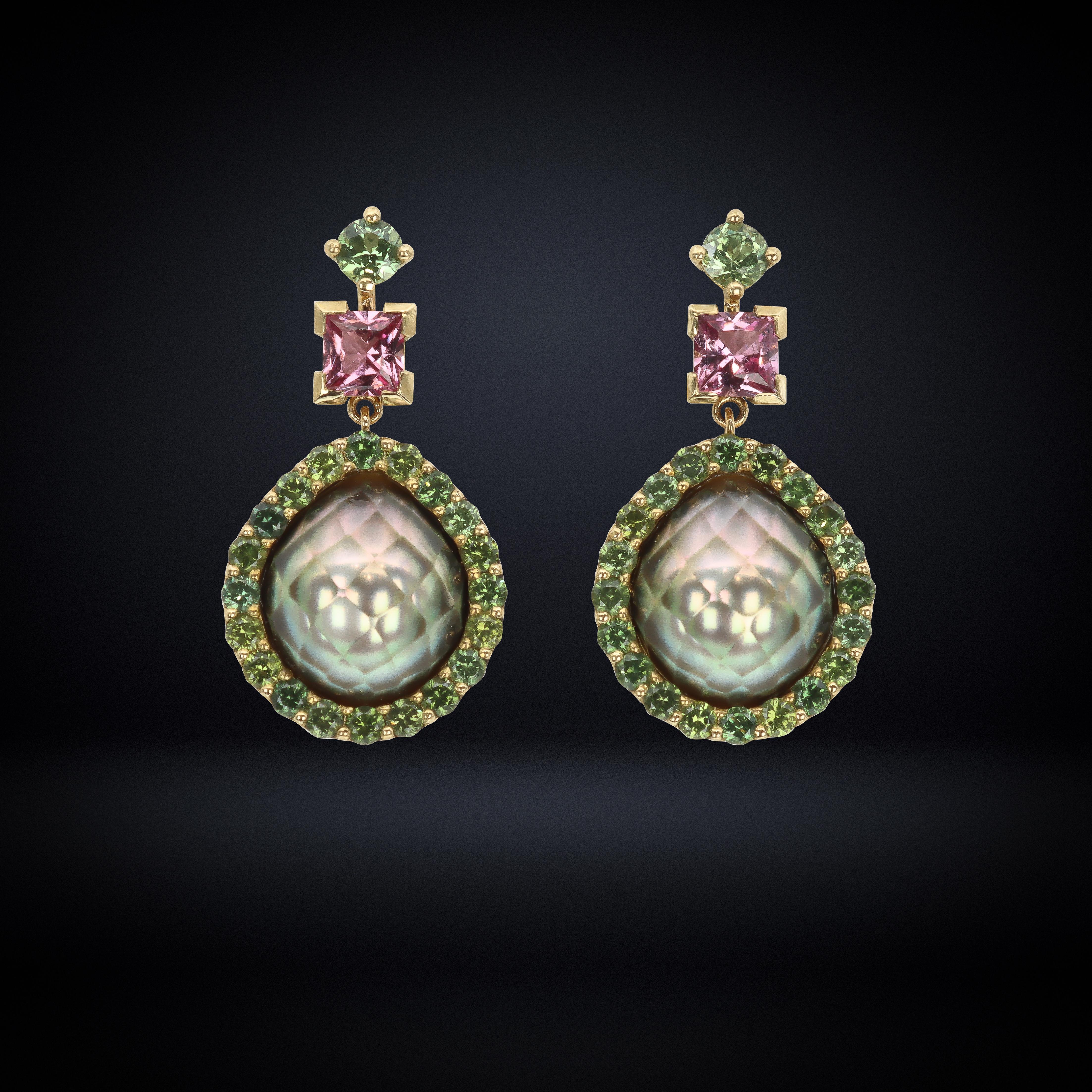 By Aventina-Spencer, these one-of-a-kind Earrings feature 2.11 carats of natural round brilliant cut Madagascan Colour Change Green Sapphires, two princess cut Malaya Garnets with a total weight of 0.95 carats and two Hand Faceted Marc'Harit Halfcut