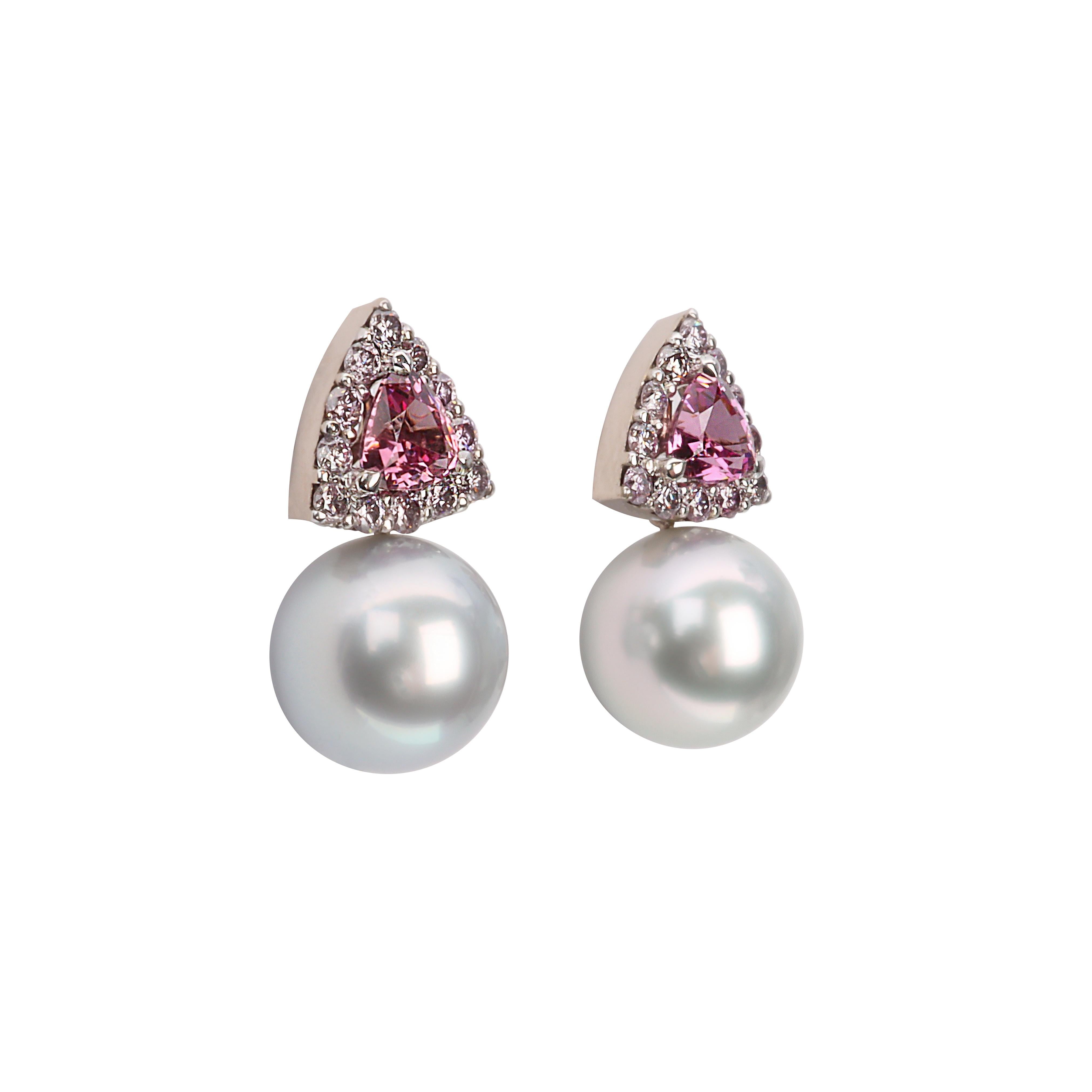  Created by Aventina-Spencer, these one-of-a-kind earrings feature twenty-four rare natural Lavender Diamonds totaling 0.72cts, two trillion cut Traceable Mahenge Malaya Garnets totaling 1.55cts and two exceptional 10.8mm Conscious Tahitian Pearls