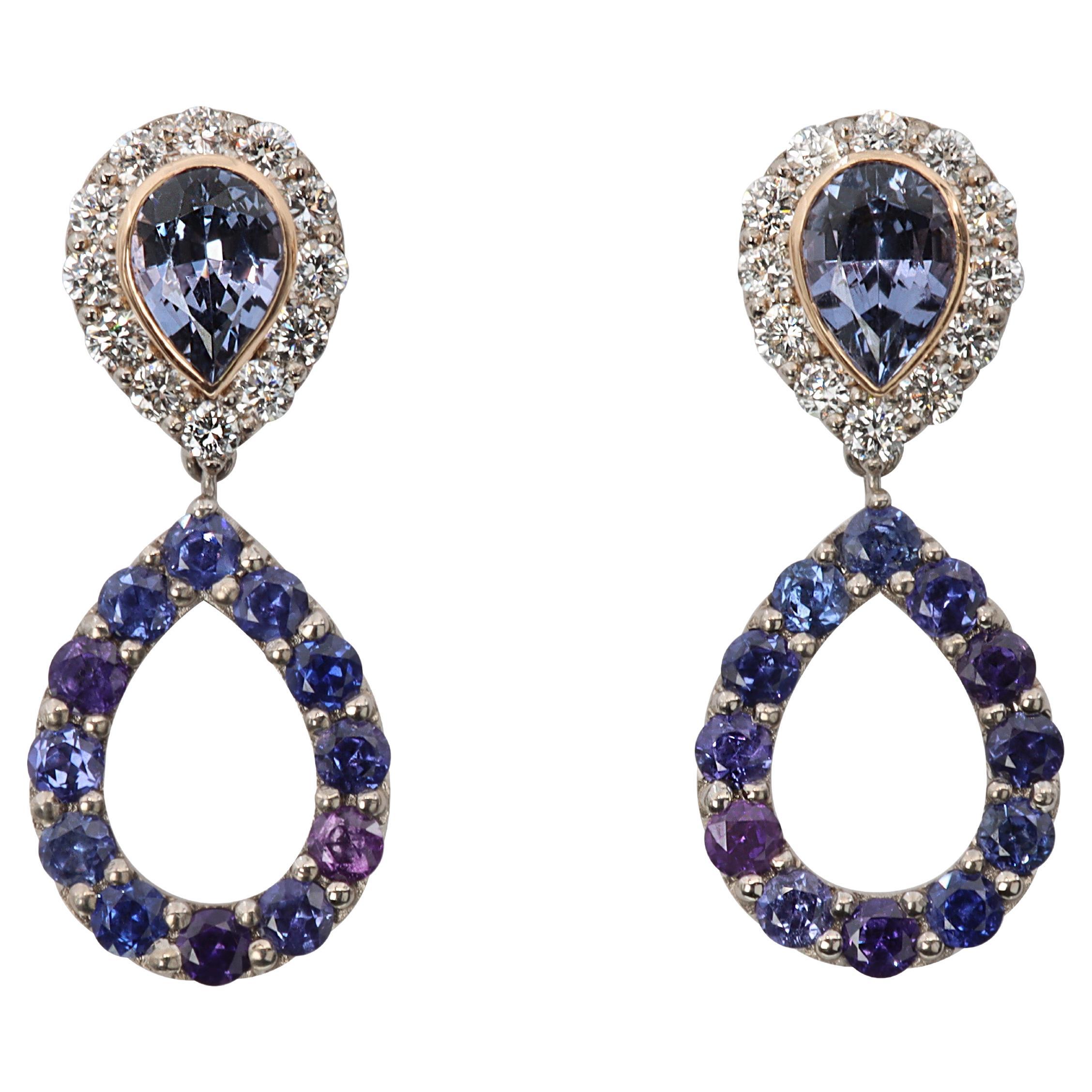 These one-of-a-kind earrings, by Aventina-Spencer, feature twenty-four round brilliant cut Natural Traceable Madagascan Colour Change Sapphires weighting a total of 1.30 carats, two Madagascan Pear shaped Lilac Spinels weighting a total of 2.00
